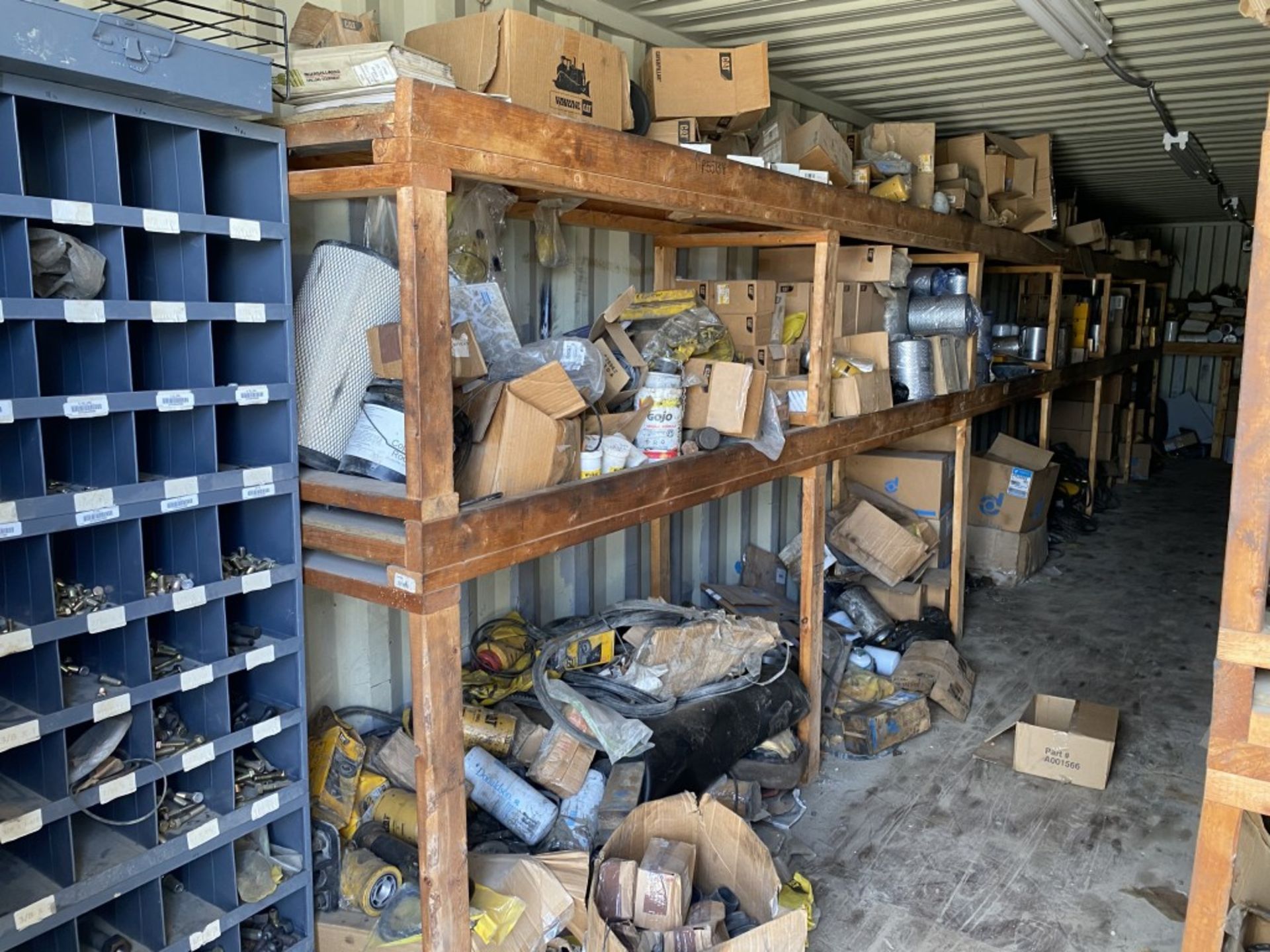 40' STEEL STORAGE CONTAINER FULL OF NEW FILTERS, HARDWARE, AND PARTS, HAS SHELVING & LIGHT - Image 2 of 24