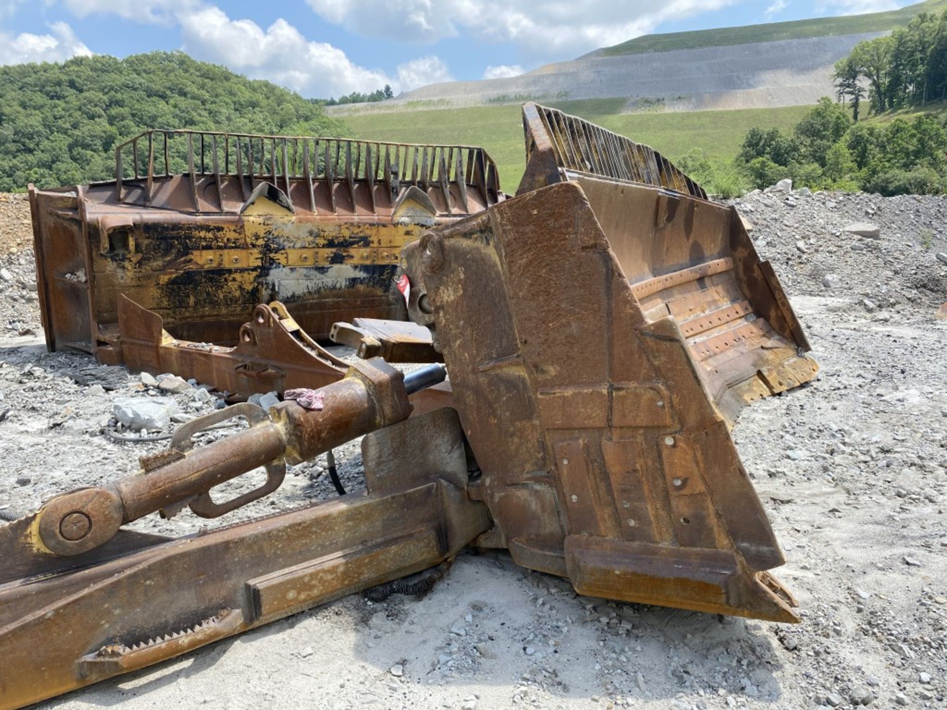 (2) USED CATERPILLAR DOZER BLADES, 16'8'' WIDE AND 20'6'' WIDE, BOTH NEED WORK LOCATION: TWIN