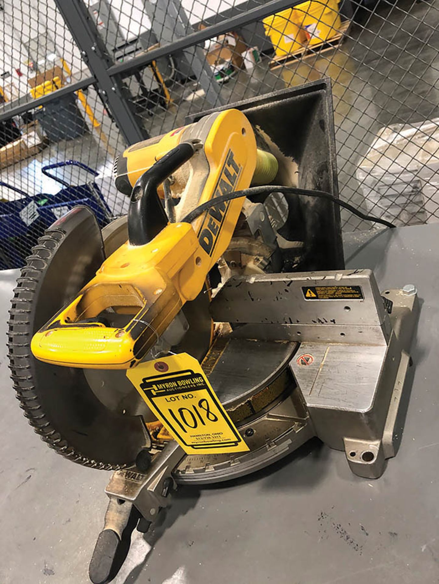DEWALT 12'' DOUBLE BEVEL COMPOUND MITER SAW, MODEL DW716, S/N 8451, MOUNTED ON STEEL TABLE