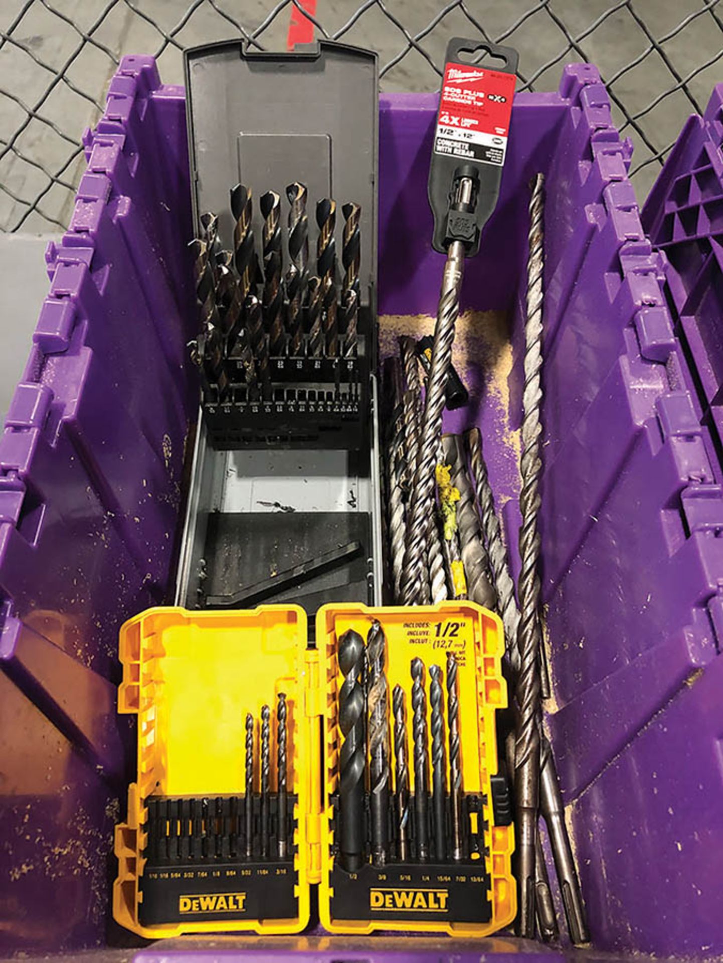 CONTAINER OF ASSORTED DRILL BITS