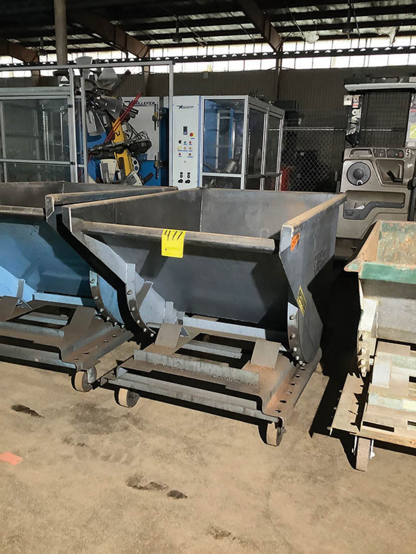 SELF-DUMPING SCRAP HOPPER