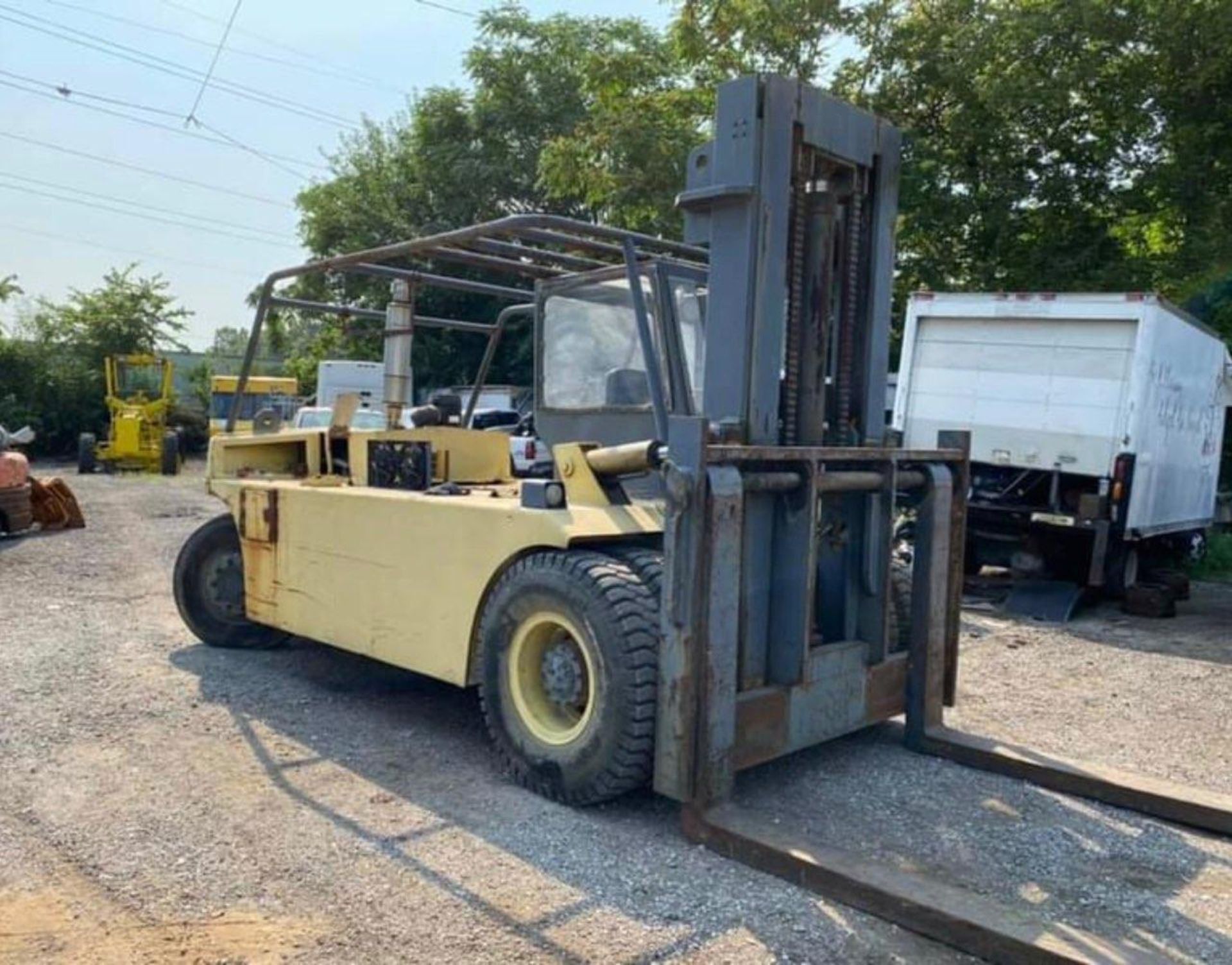 HERCULES FORKLIFT, 26,000 LB. CAPACITY, DIESEL SUPER FORD TURBO MOTOR, TILT, RUNS AND OPERATES