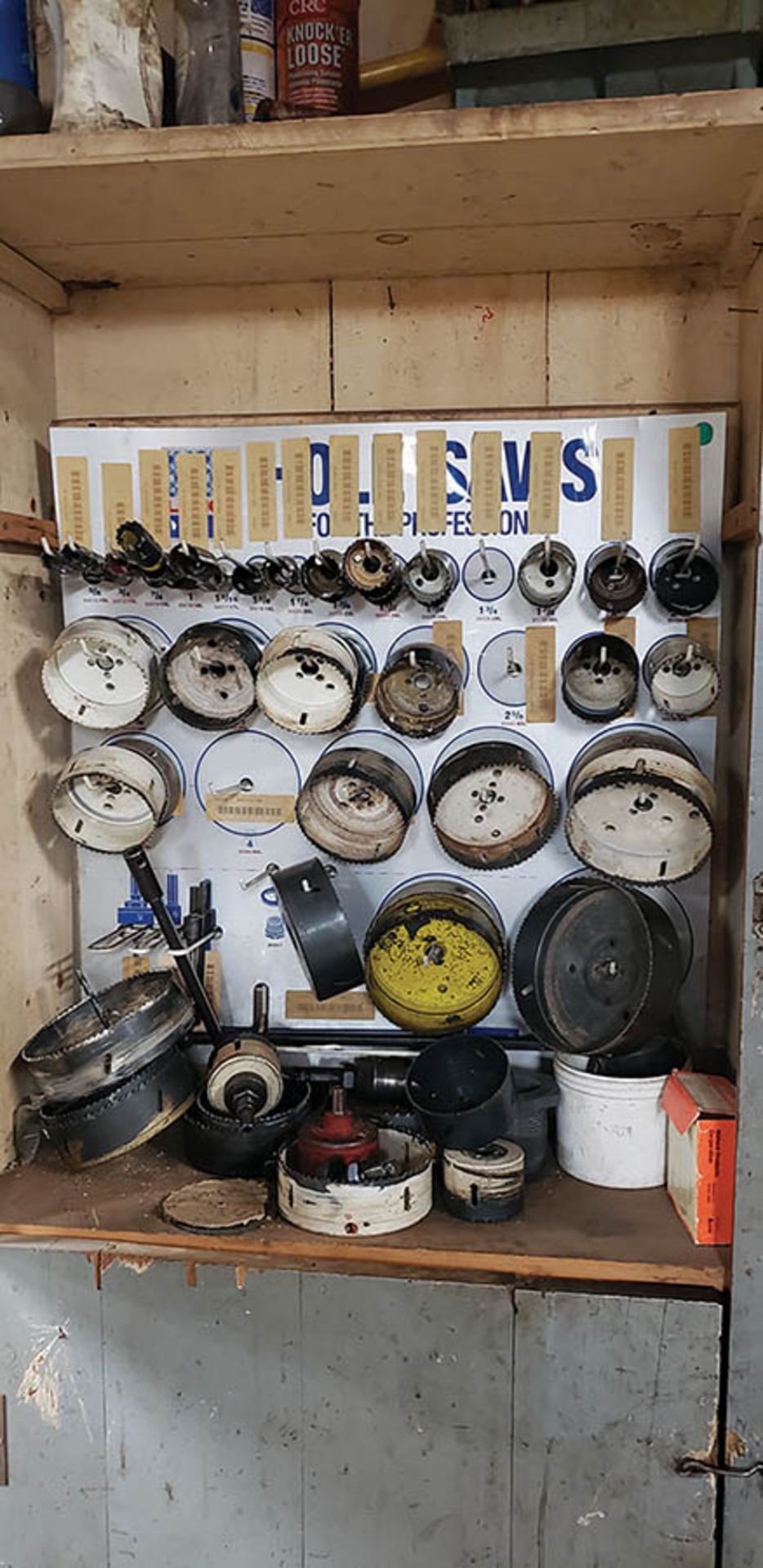 (2) WOOD CABINETS W/ CONTENTS: ASSORTED HOLE SAWS, AND MISC.