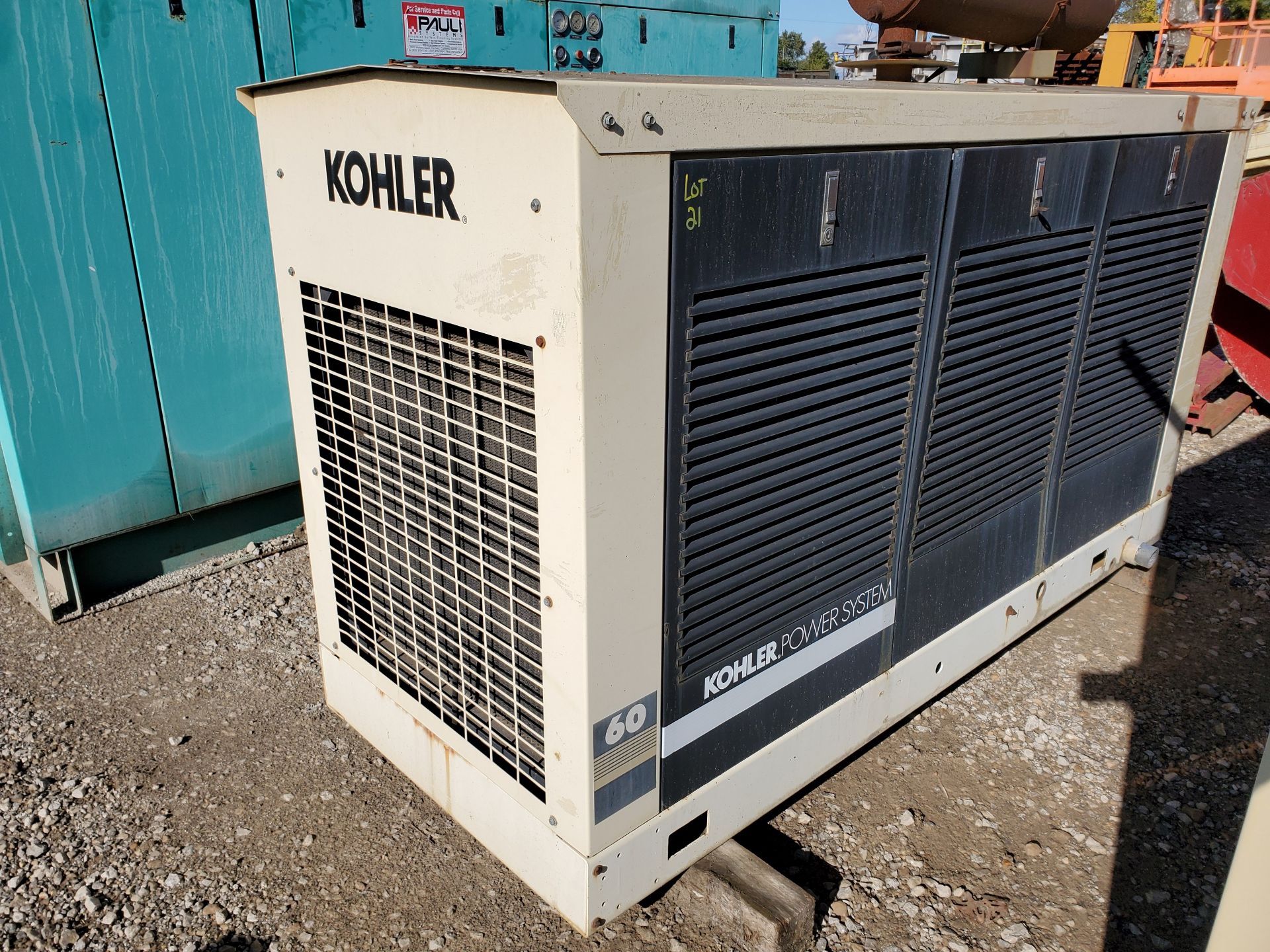 KOHLER NATURAL GAS POWER GENERATOR, MODEL 60RZ, AUTOMATIC 13V OUTPUT BATTERY CHARGER, 2000 YEAR FORD