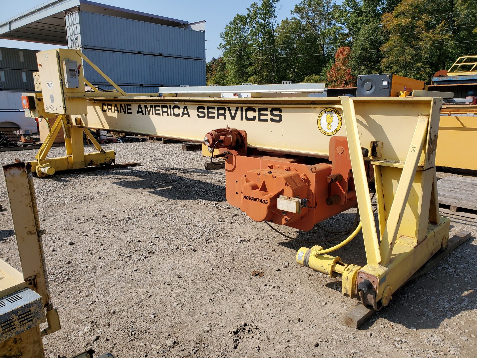 10-TON BRIDGE CRANE, 22' BEAM, TON ELECTRIC CABLE HOIST WITH PENDANT CONTROLS AND HOOK