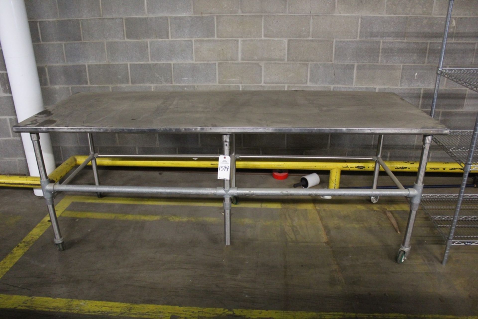 Stainless Steel Table on Casters | Rig Fee: Hand Carry or Contact Rigger