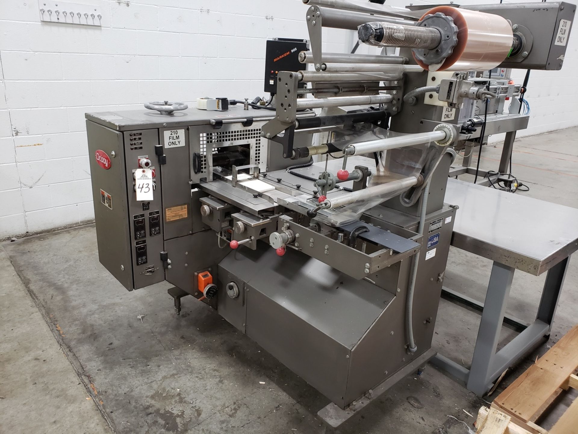 Doboy Model Mustang IV Pass Through Conveyor Type Wrapper, S/N 93-15314, (1993); | Rig Fee: $450