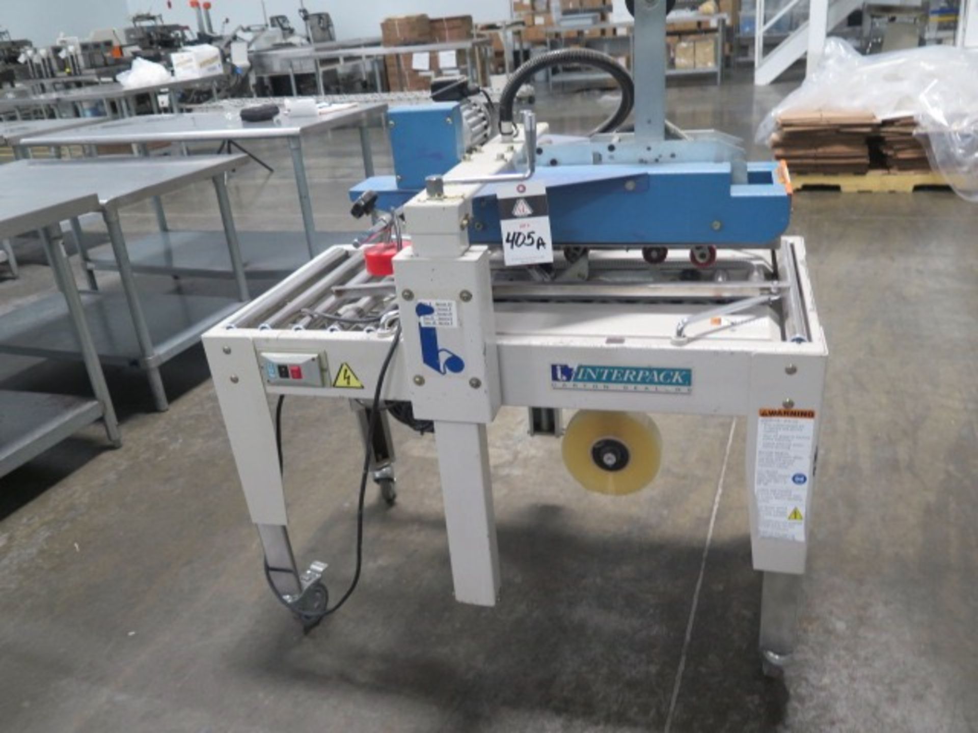 Interpack Model USC2020-TB Carton Sealer s/n H03T124030 | Rig Fee: $150