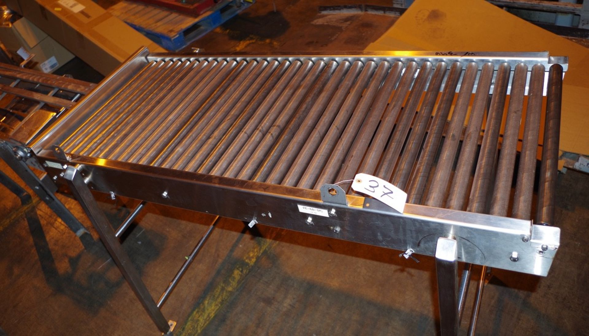 Stainless Steel Roller Outfeed Table, approx. 5'L x 30" W | Rig Fee: $50