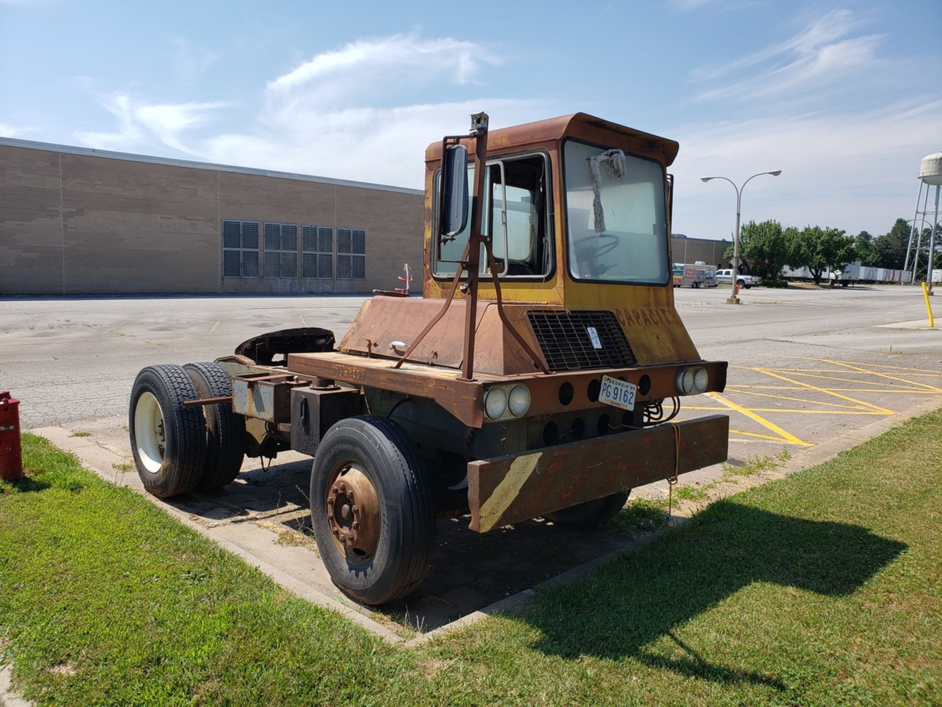 Capacity Yard Dog Tractor, M# TJ-4000, S/N 4000-187 Rig Fee: $Buyer To Remove