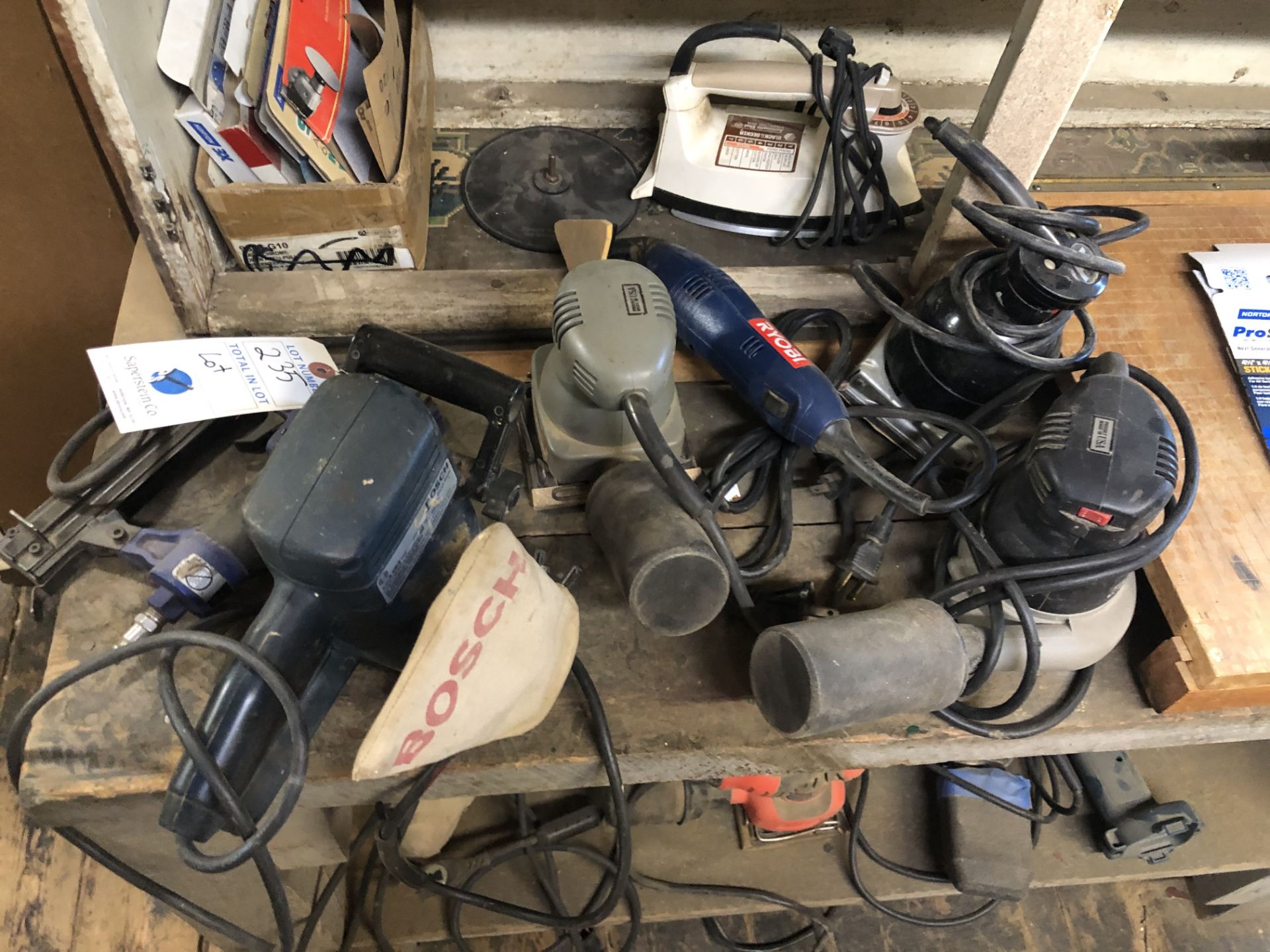 {LOT} In Cabinet c/o: Ridgid & Asst. Power Sanders, Staplers, Multi Tool, Etc.