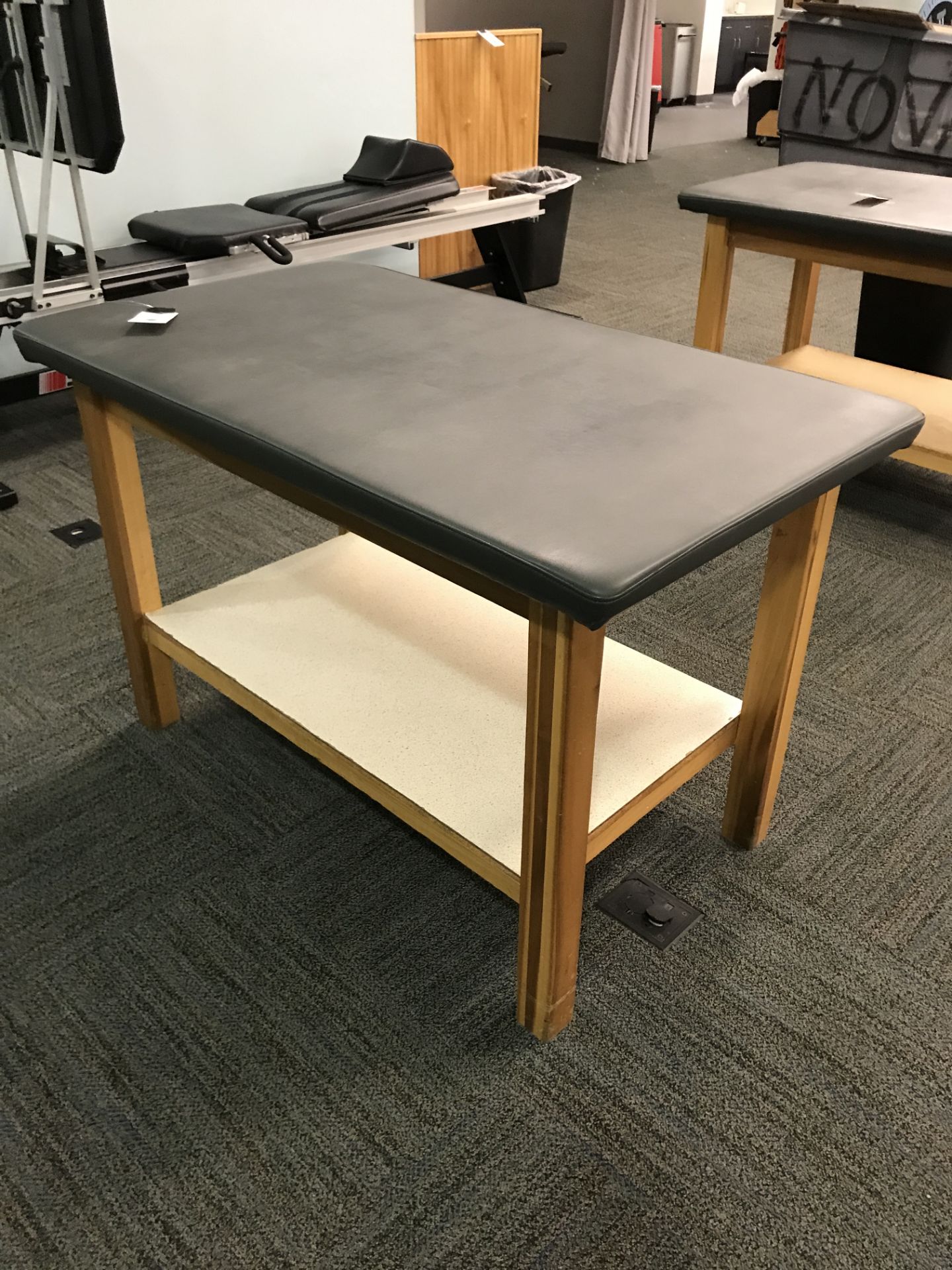 50" x 29" Upholstered Top Wood Base Table