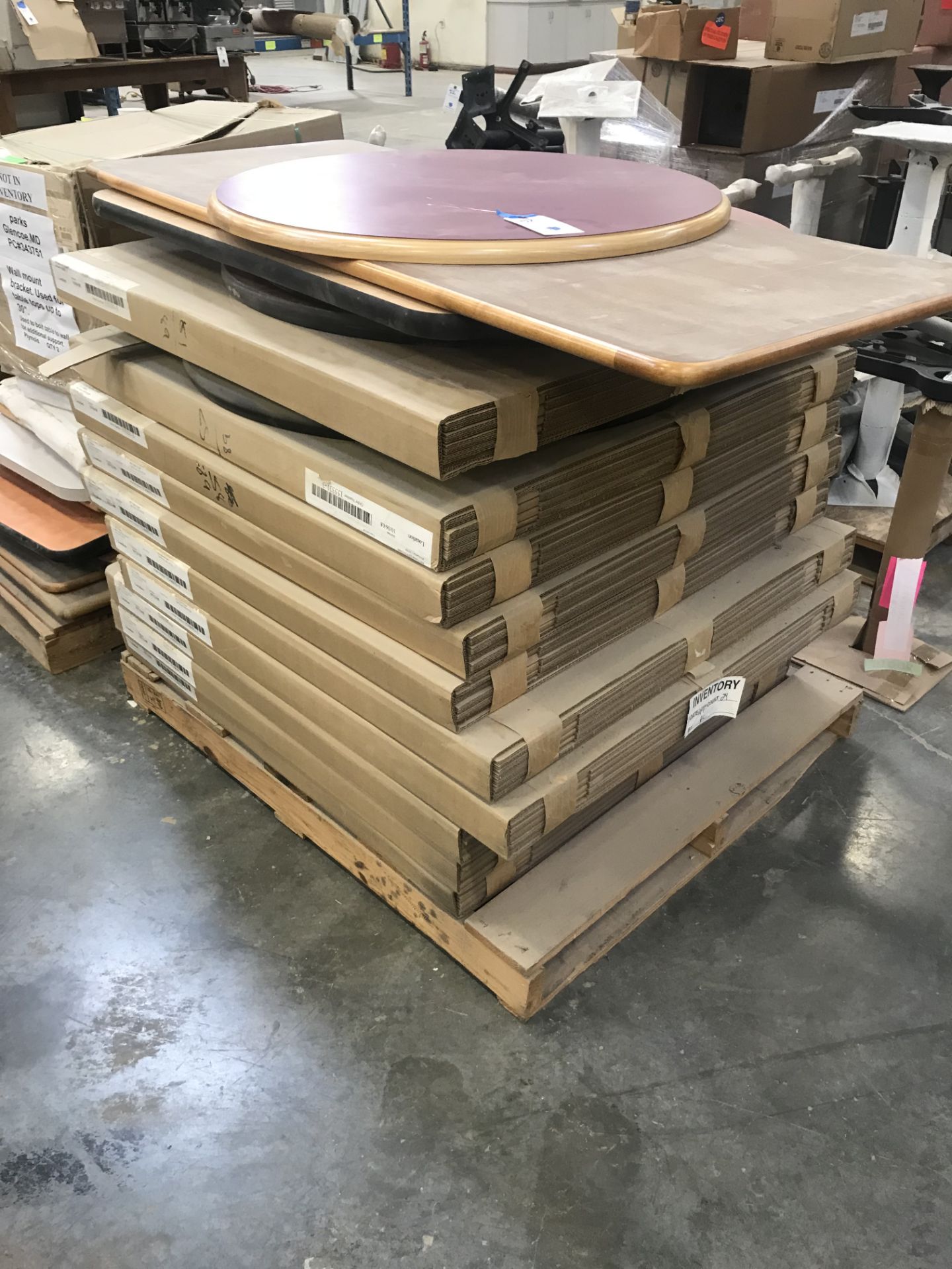 {LOT} (10 Pallets) Assorted Table Tops Wood and Laminate Round, Square, Rectangular and Assorted