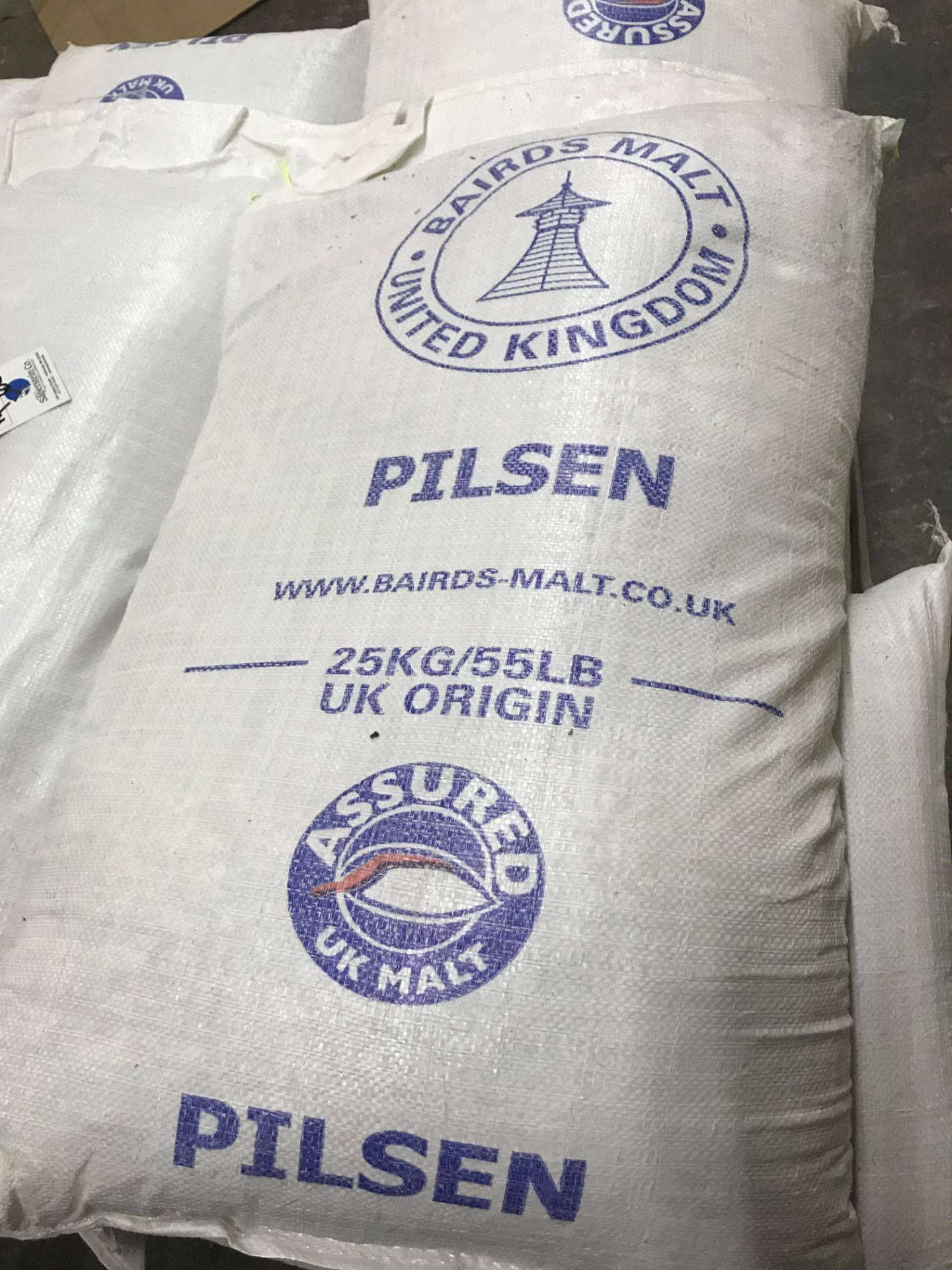 {LOT} On 2 Pallets 55 Lb. Pre Milled Ground Mill Grain Pilsen Malt Approx. 60 Bags