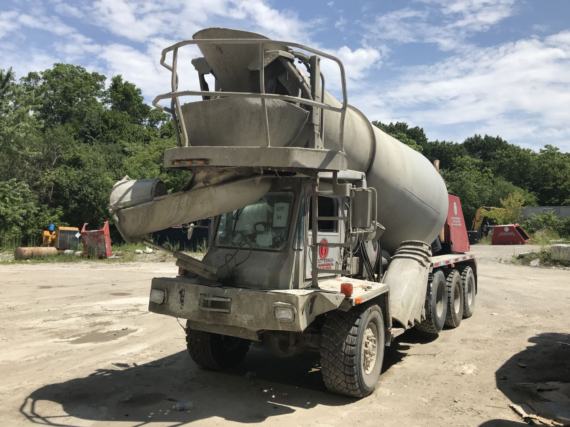 2000 OSHKOSH FRONT DISCHARGE CEMENT MIXER, 4 AXLE, 8 WHEEL, 6X6, CAT C-10, ALLISON 4560P, 11 CY,