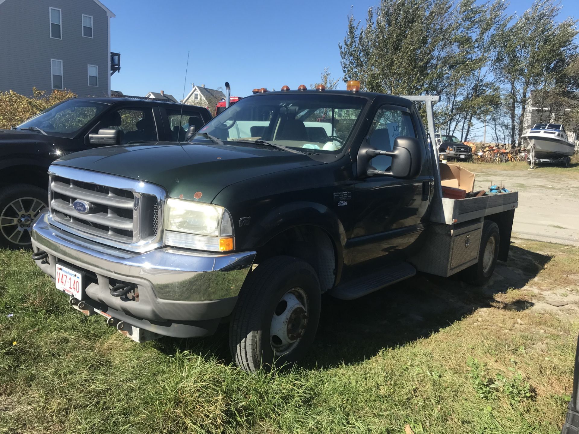 2002 Ford F350 XLT 4x4, V10 Gas, Auto, 8' Wood Flatbed, Winch, Arctic 9' Plastic Plow, Odom. VIN