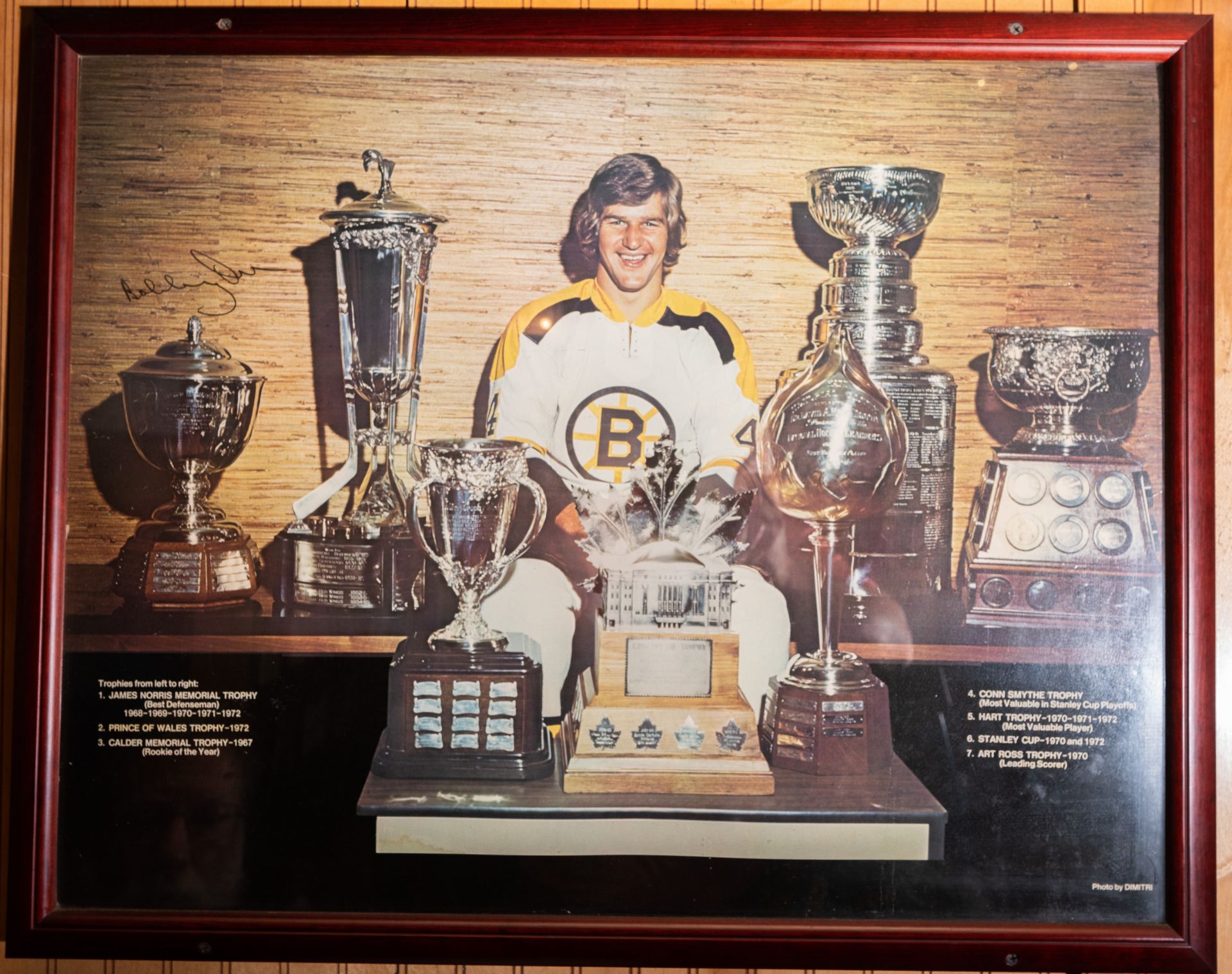 Bobby Orr w/ 7 Trophy's Photo Signed "Bobby Orr", Trophy's in Picture Include Norris, Wales, Calder,