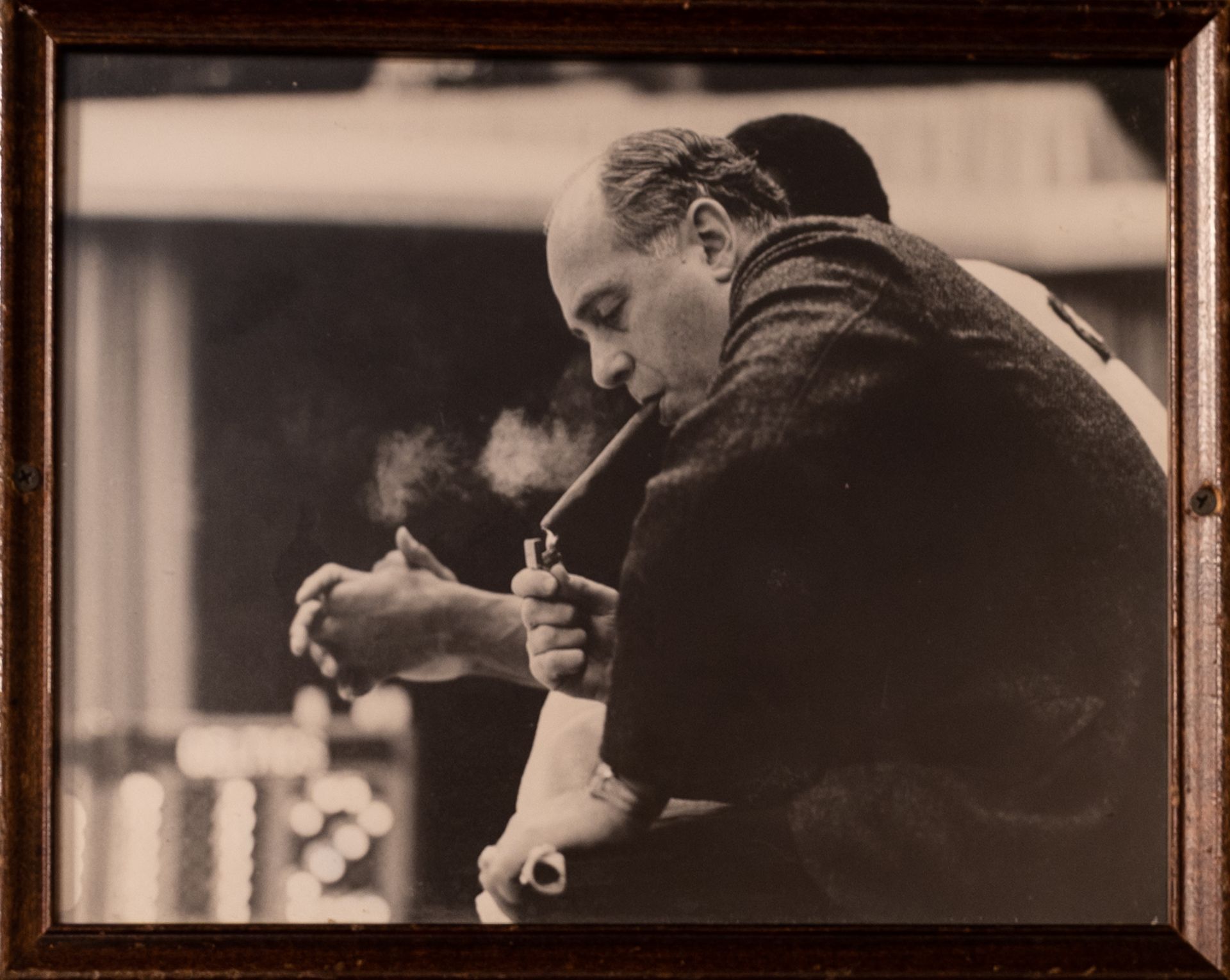 Red Auerbach Lighting up a Cigar Framed Photo 15"x12"