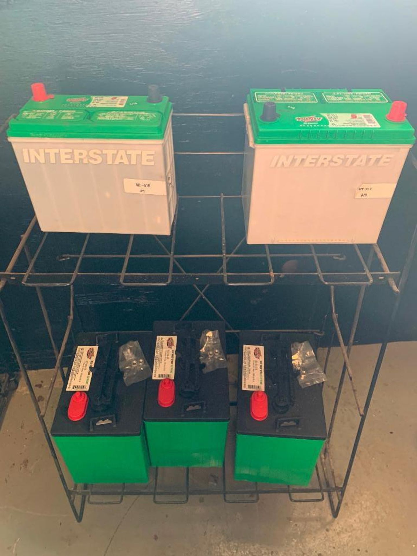 5 New Interstate Batteries and Shelf
