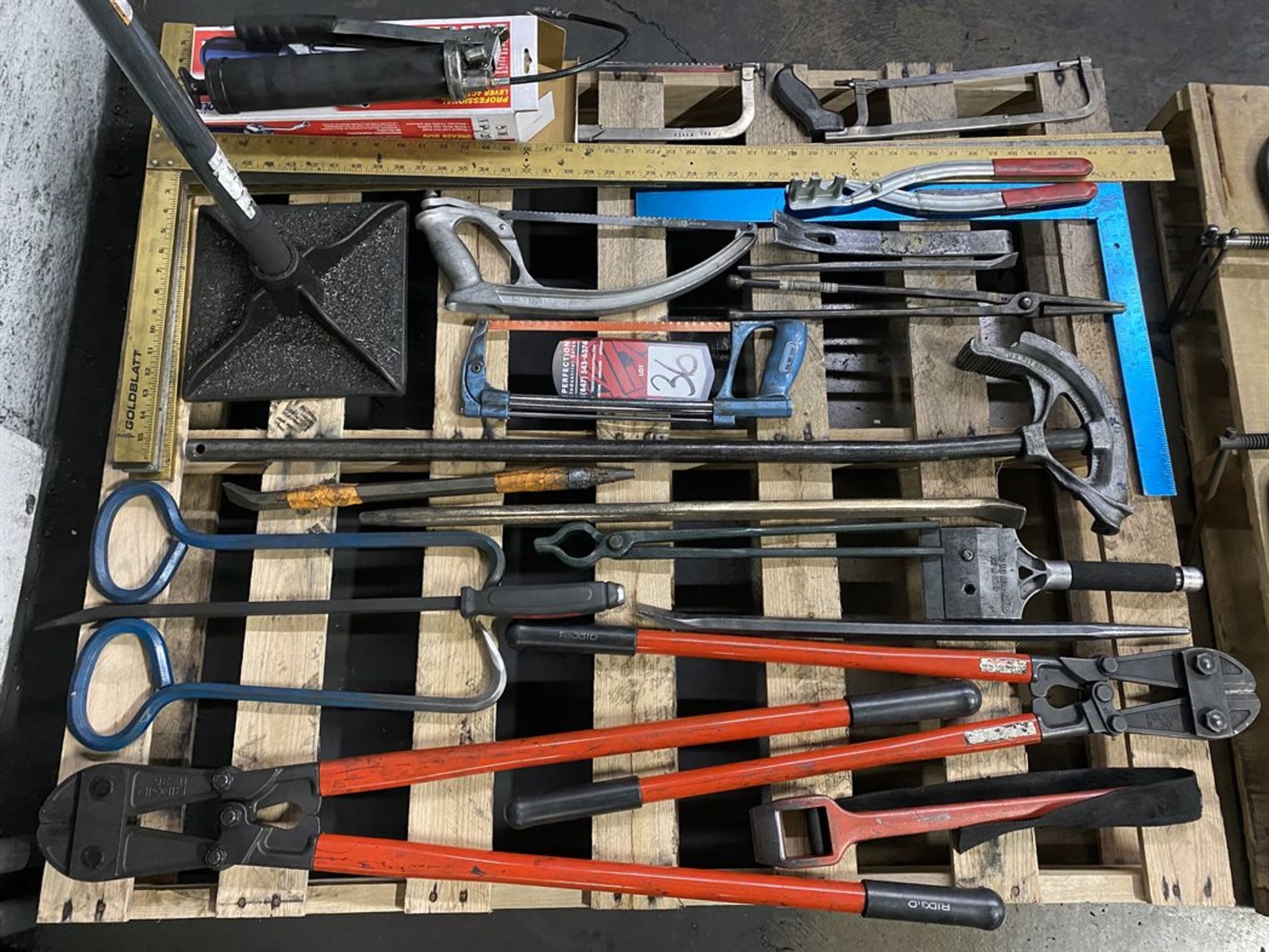 Lot Comprising Assorted Bolt Cutters, Hack Saws, T-Squares and Pry Bars