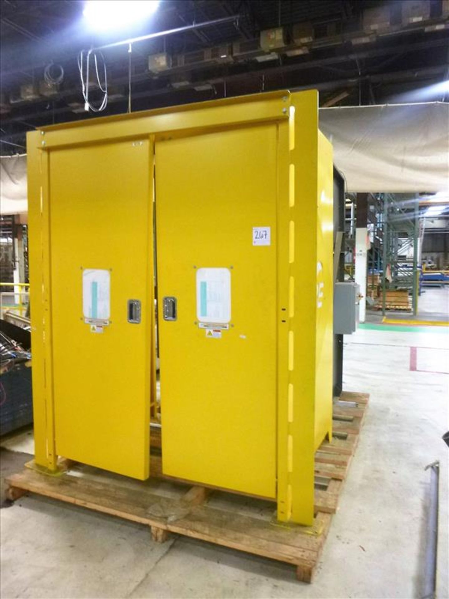 NBE Hydraulic Dumper, 2500 lbs. cap., 72" Lift Hight, 42" x 50" Platform, 3 Hp c/w Safety Enclosure