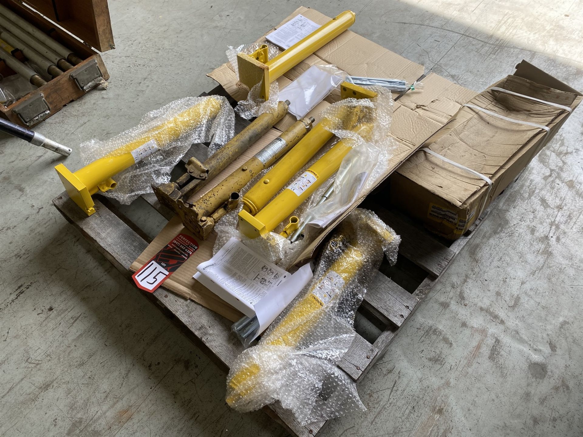 Pallet of New and Used 1.5-2 Ton ENERPAC Hydraulic Jacks
