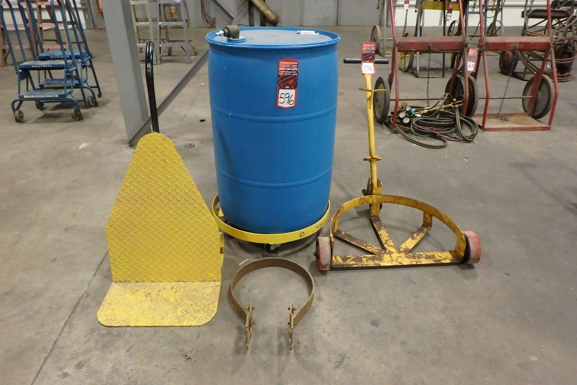 Lot Comprising (1) Drum Dolly; (1) Drum Clamp; (1) 55 Gal. Capacity Plastic Drum w/ Drum Dolly; (