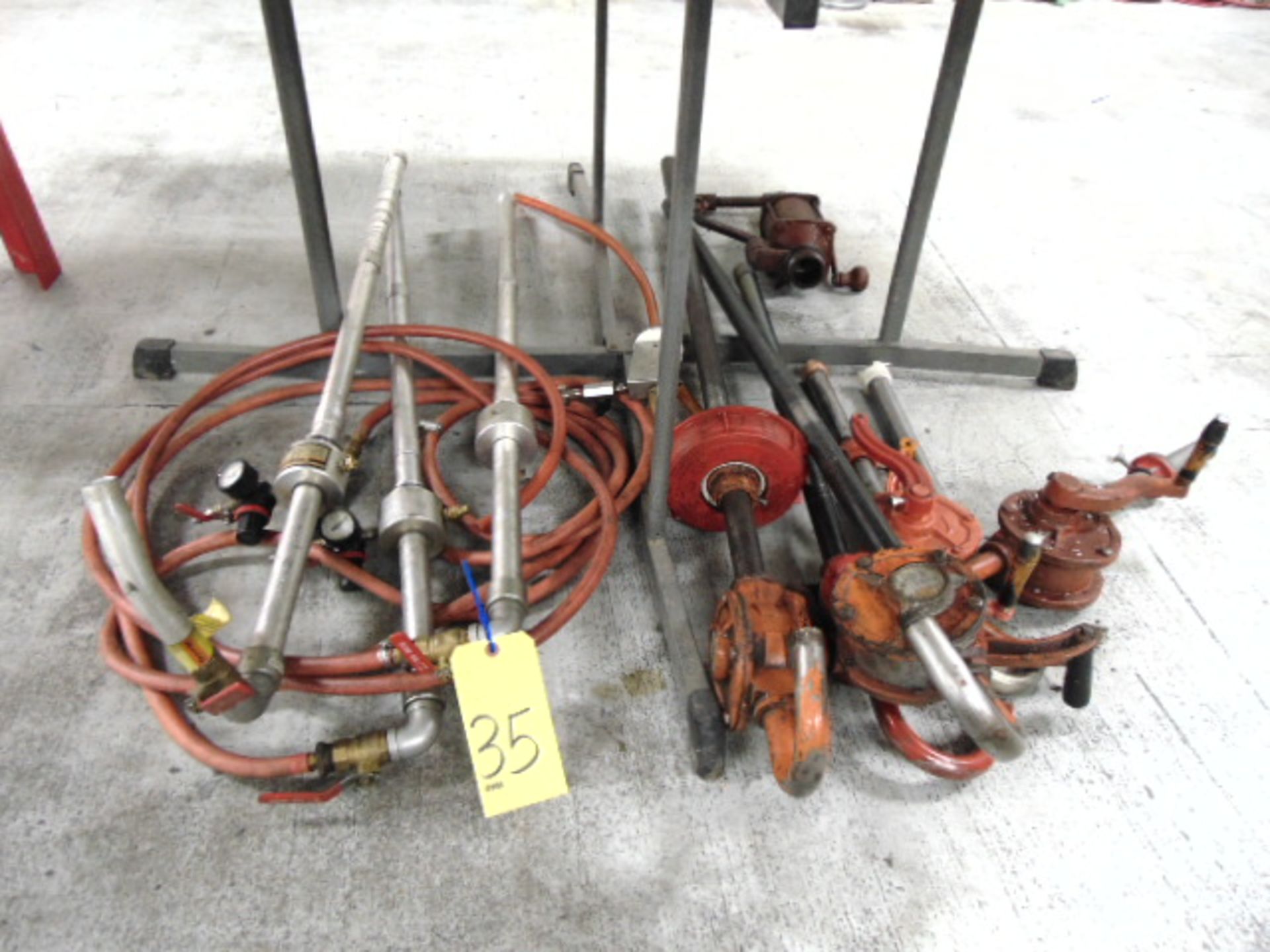 LOT OF BARREL PUMPS, assorted (under one table)