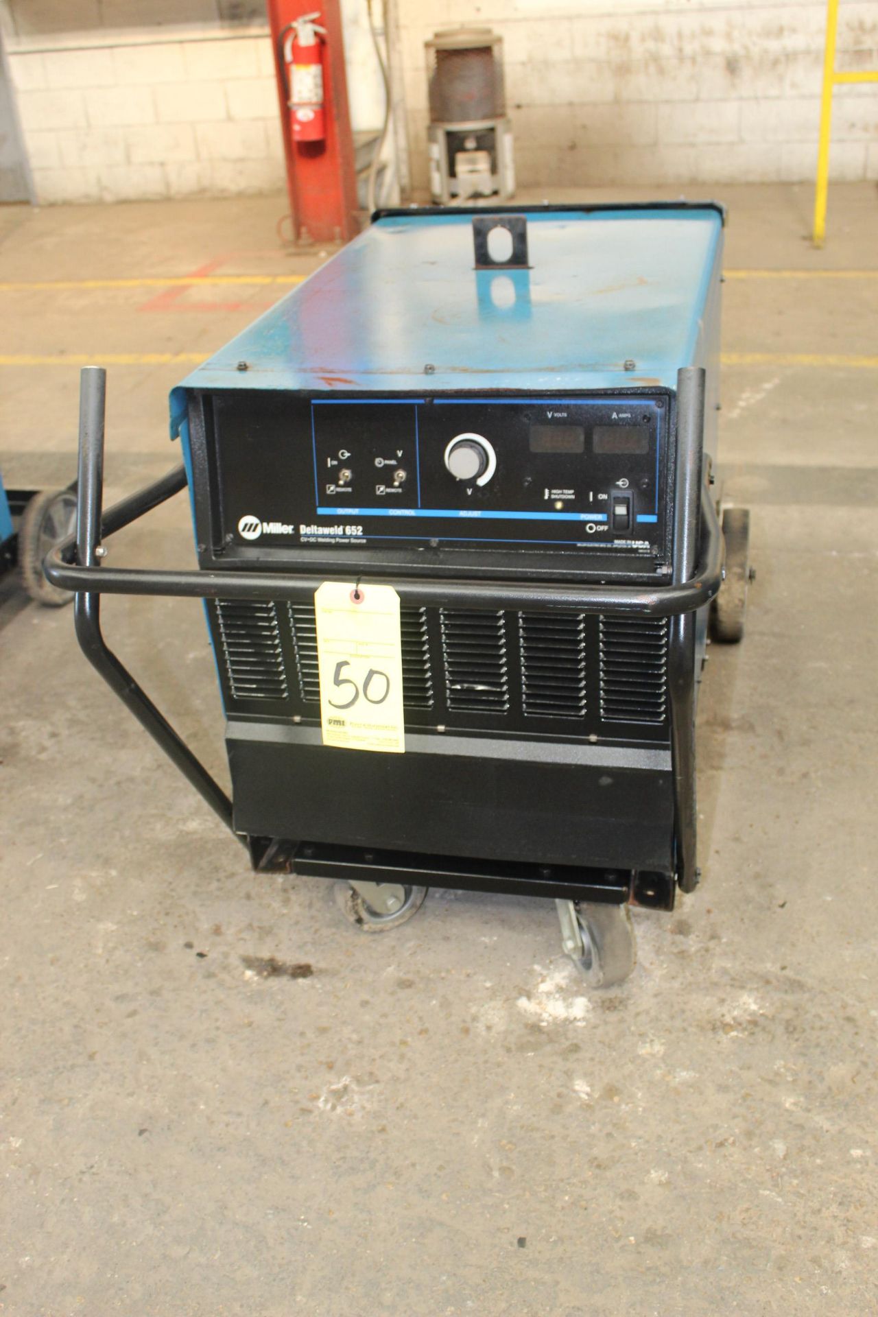 WELDING MACHINE, MILLER MDL. DELTAWELD 652, 650 amps @ 44 v., 100% duty cycle, S/N MA020992C