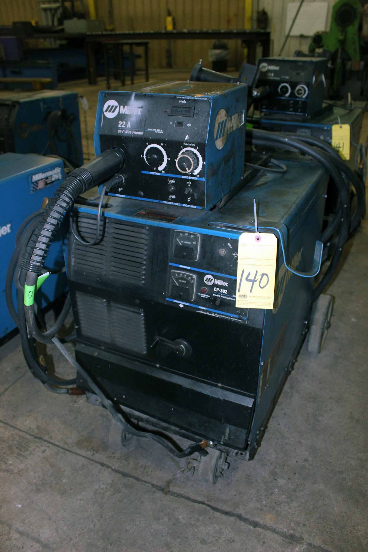 WELDING MACHINE, MILLER MDL. CP-302. 300 amps. @ 32 v., 100% duty cycle, w/Miller 22A wire feeder,