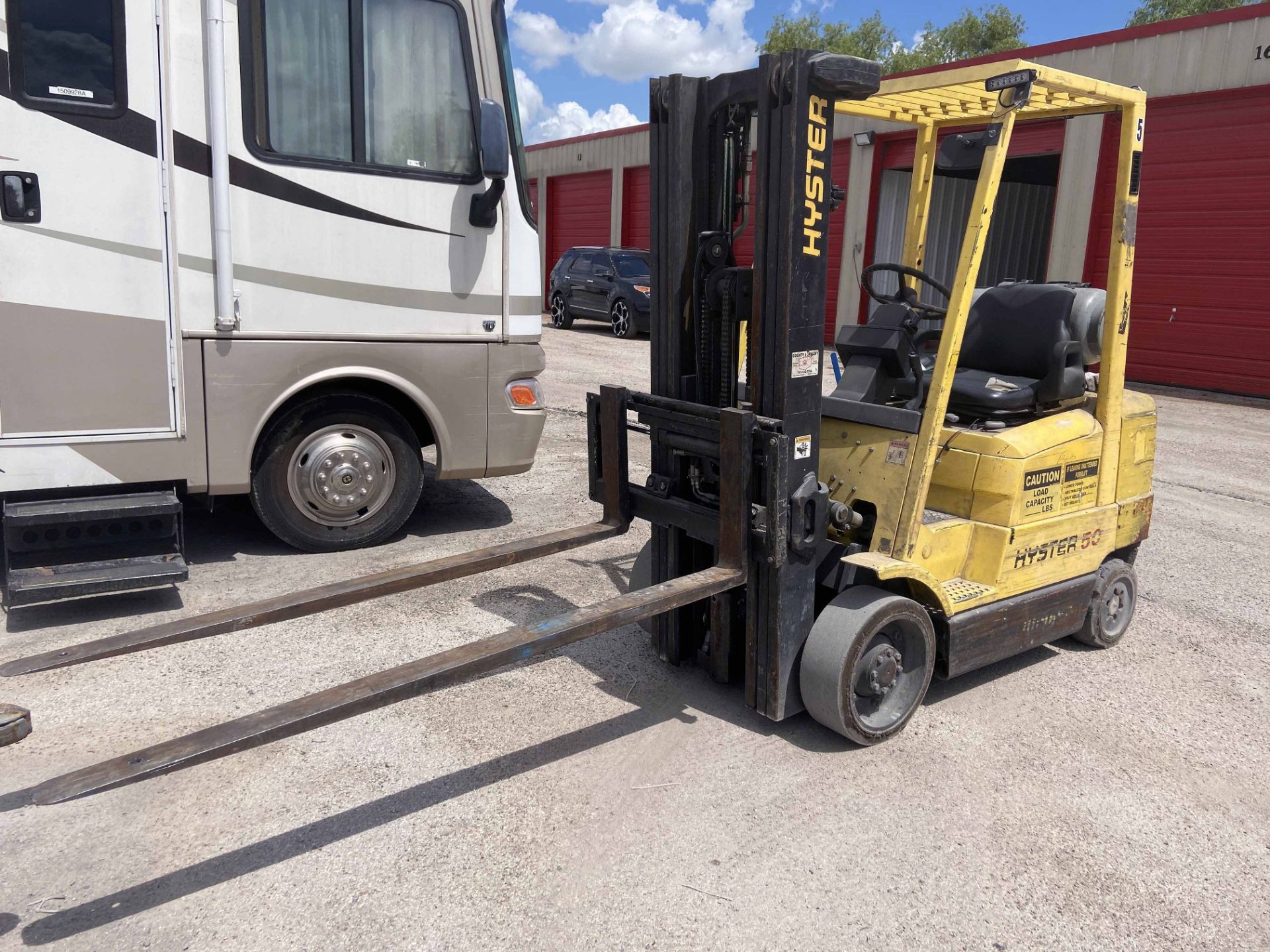 FORKLIFT, HYSTER S50XM, 5,000 LB. CAP., 189” lift ht., 3-stage mast, cushion tires, LP power, S/N