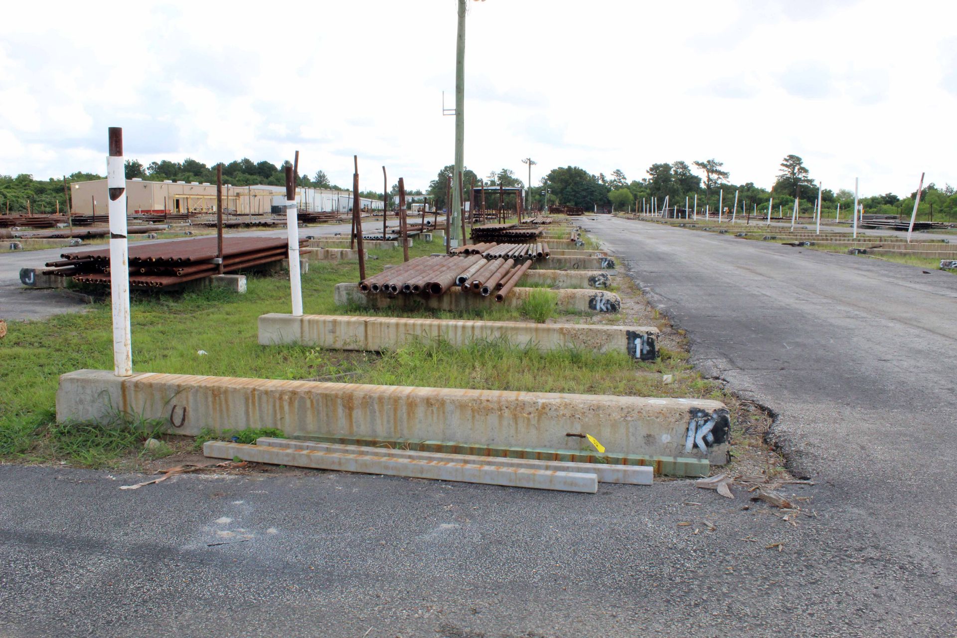 LOT OF CONCRETE PIPE SLEEPERS (APPROX. 28), ROW 9, 15'L.