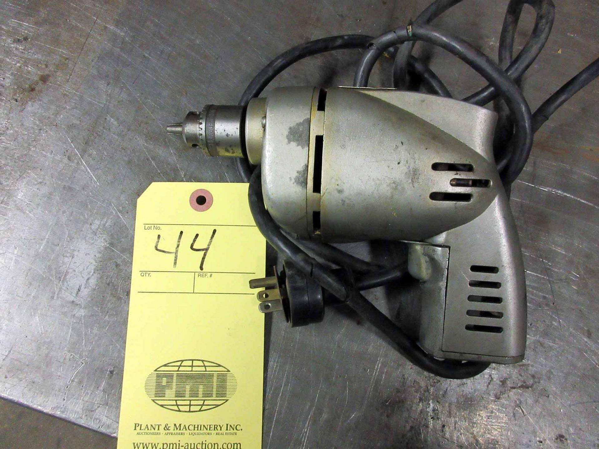 LOT CONSISTING OF: Skil 1/4" drill & chuck