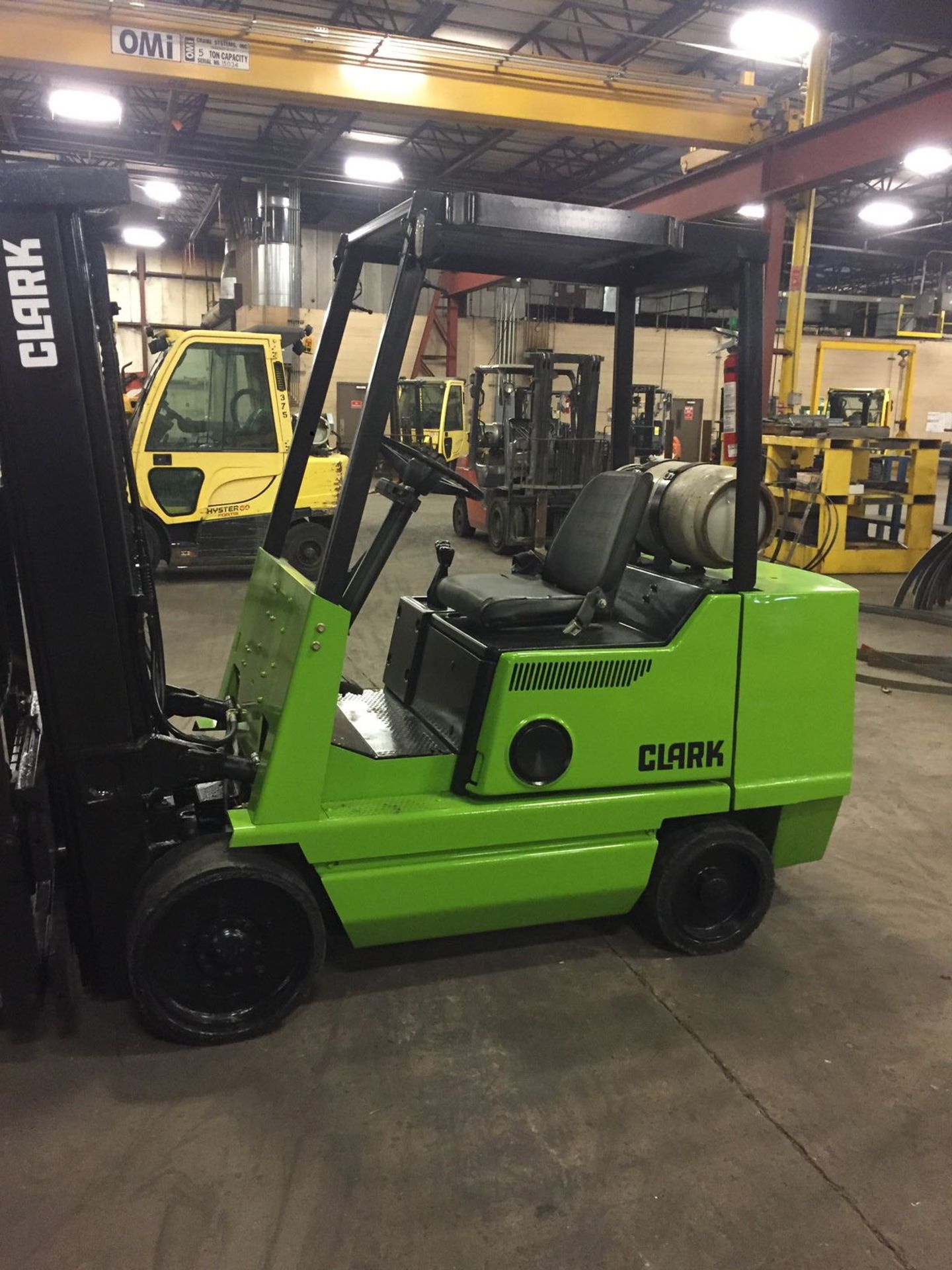 FORKLIFT, CLARK 6,000 LB. CAP. MDL. GCX30EM, LPG, 189" max. lift ht., 83" 3-stage mast, side