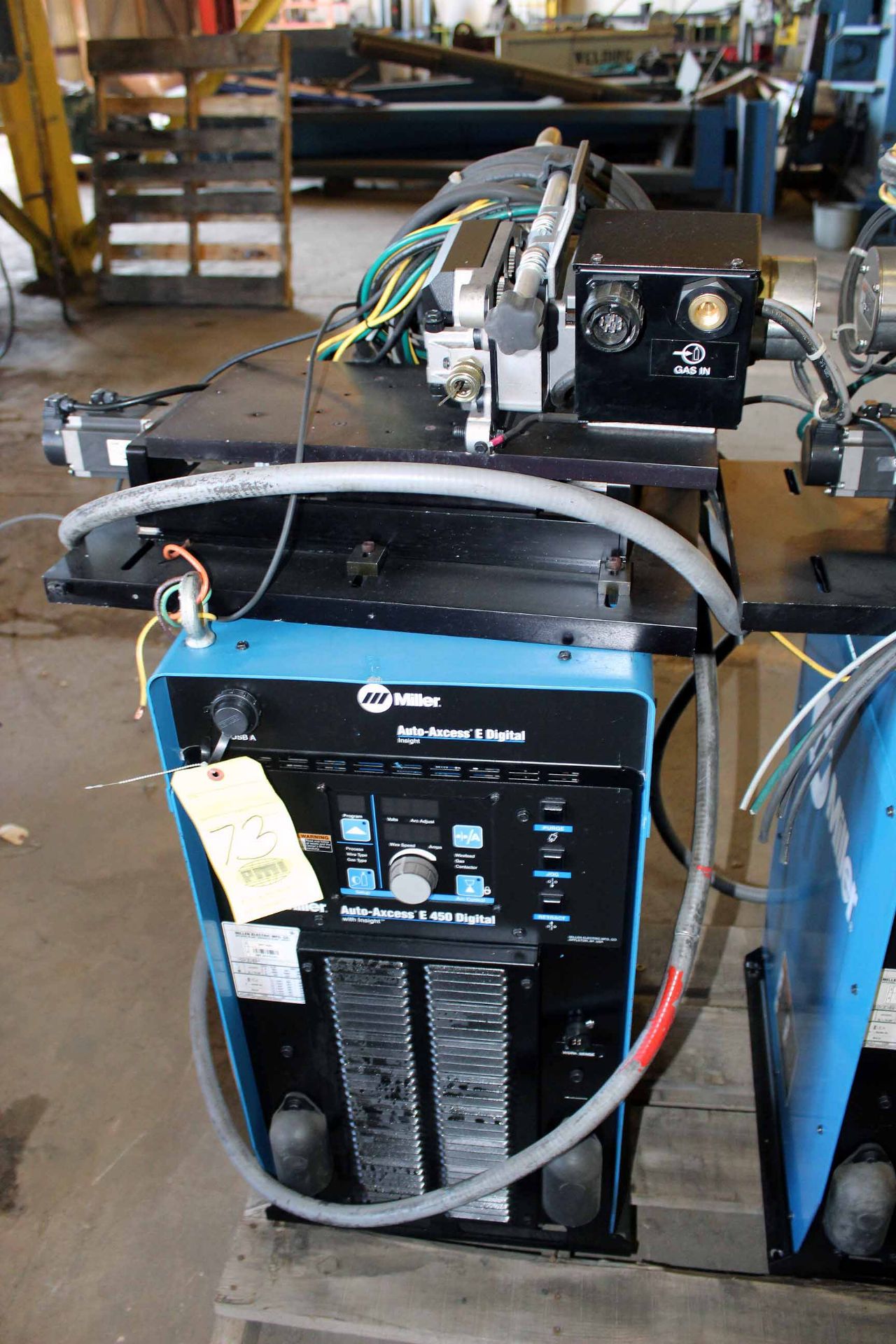 MIG WELDER, MILLER MDL. AUTO-AXCESS E450, new 2016, wire feed units on pwrd. slides, S/N