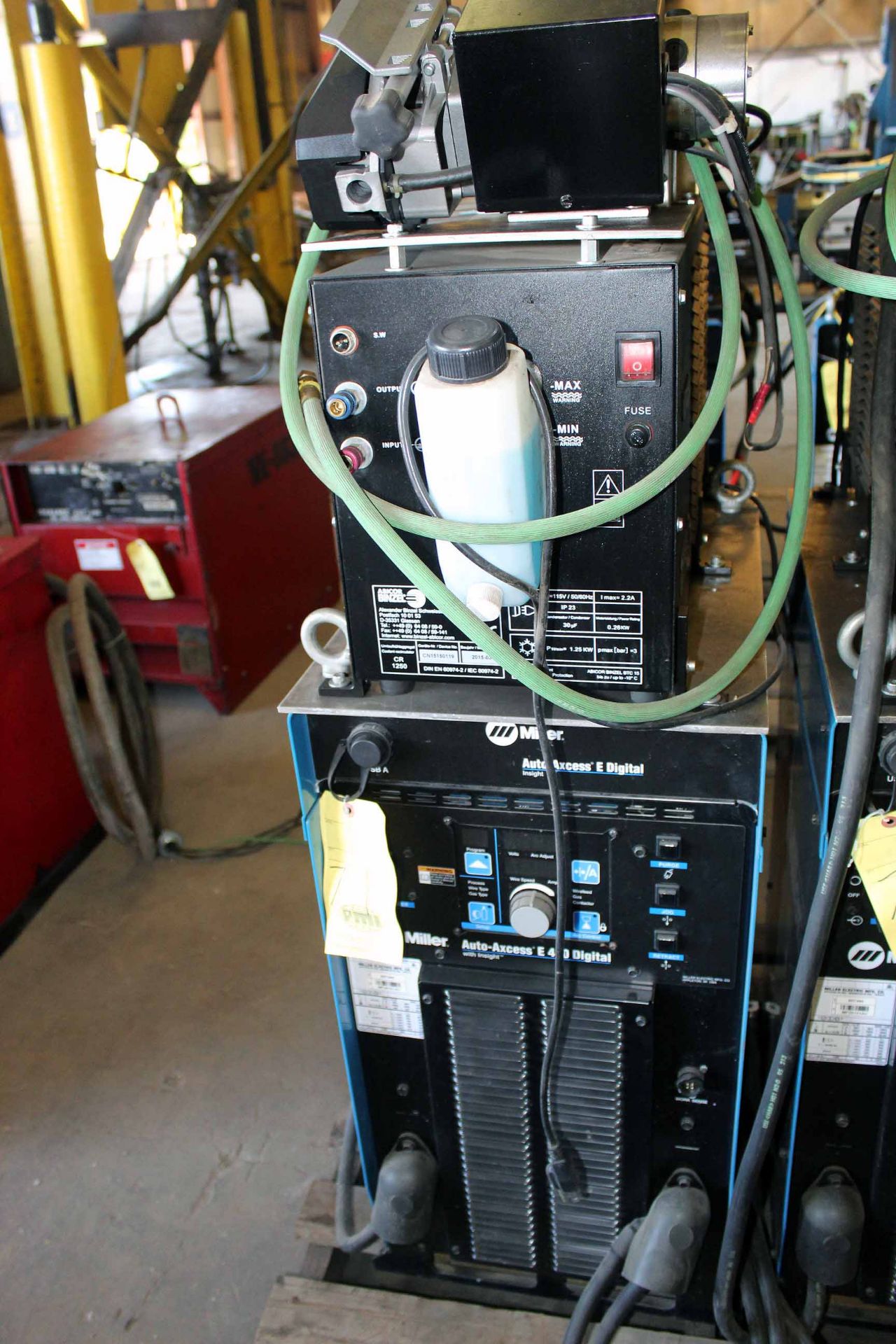 MIG WELDER, MILLER MDL. AUTO-AXCESS E450, new 2016, wire feed units on pwrd. slides, S/N