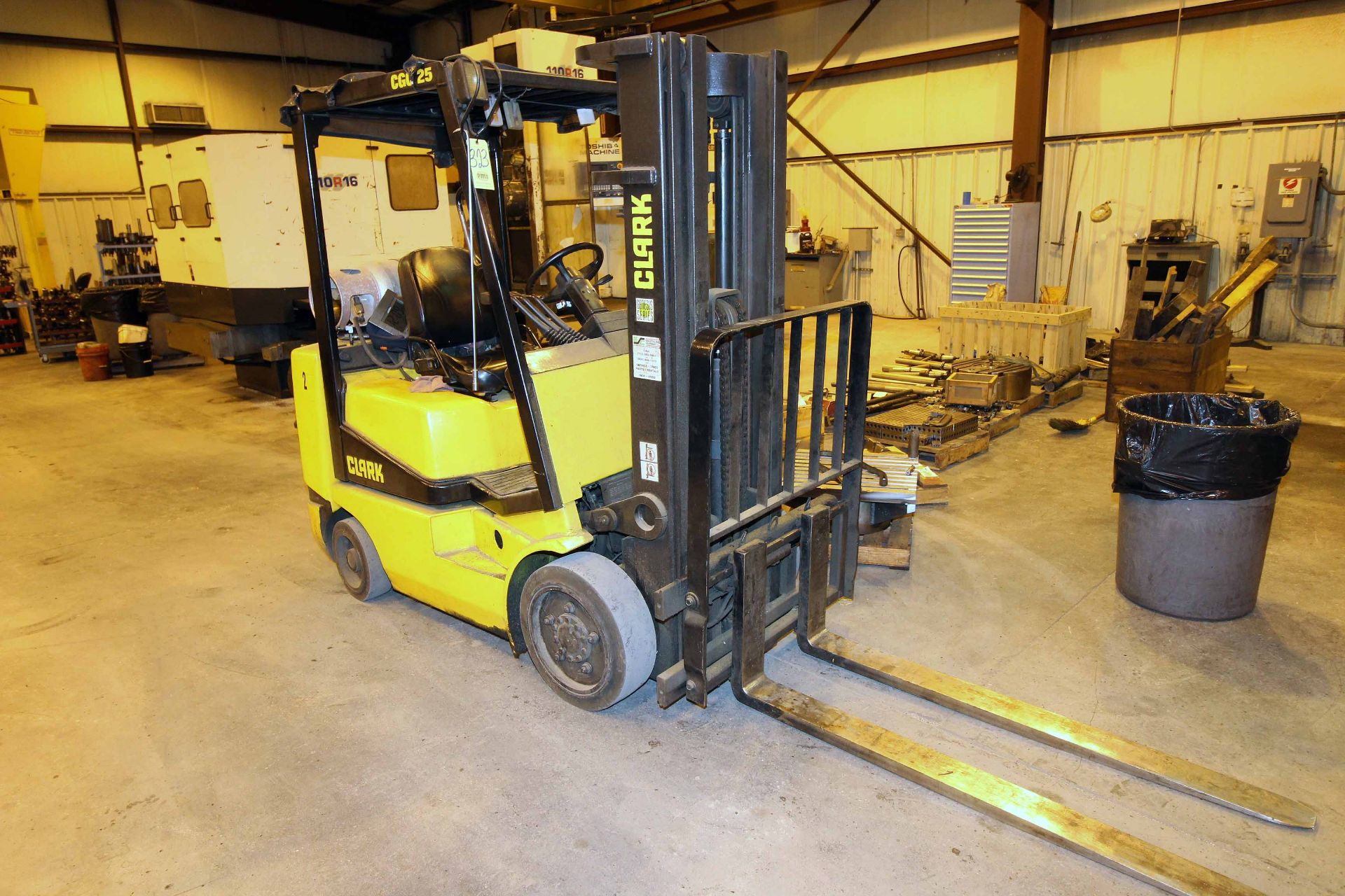 FORKLIFT, CLARK 5,000 LB. BASE CAP. MDL. CGC25, LPG, 3-stage mast, 189” lift ht., solid tires,