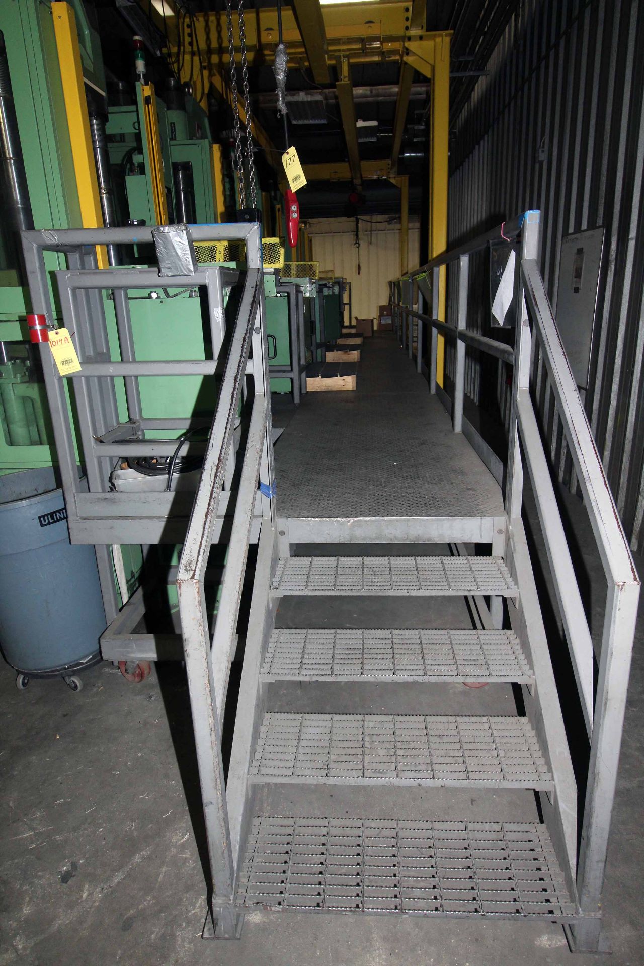 STEEL WORK PLATFORM, DIAMOND PLATE CONSTRUTION, 40'L X 4'W IN 2 SECTIONS, ON ROLLER CASTERS,