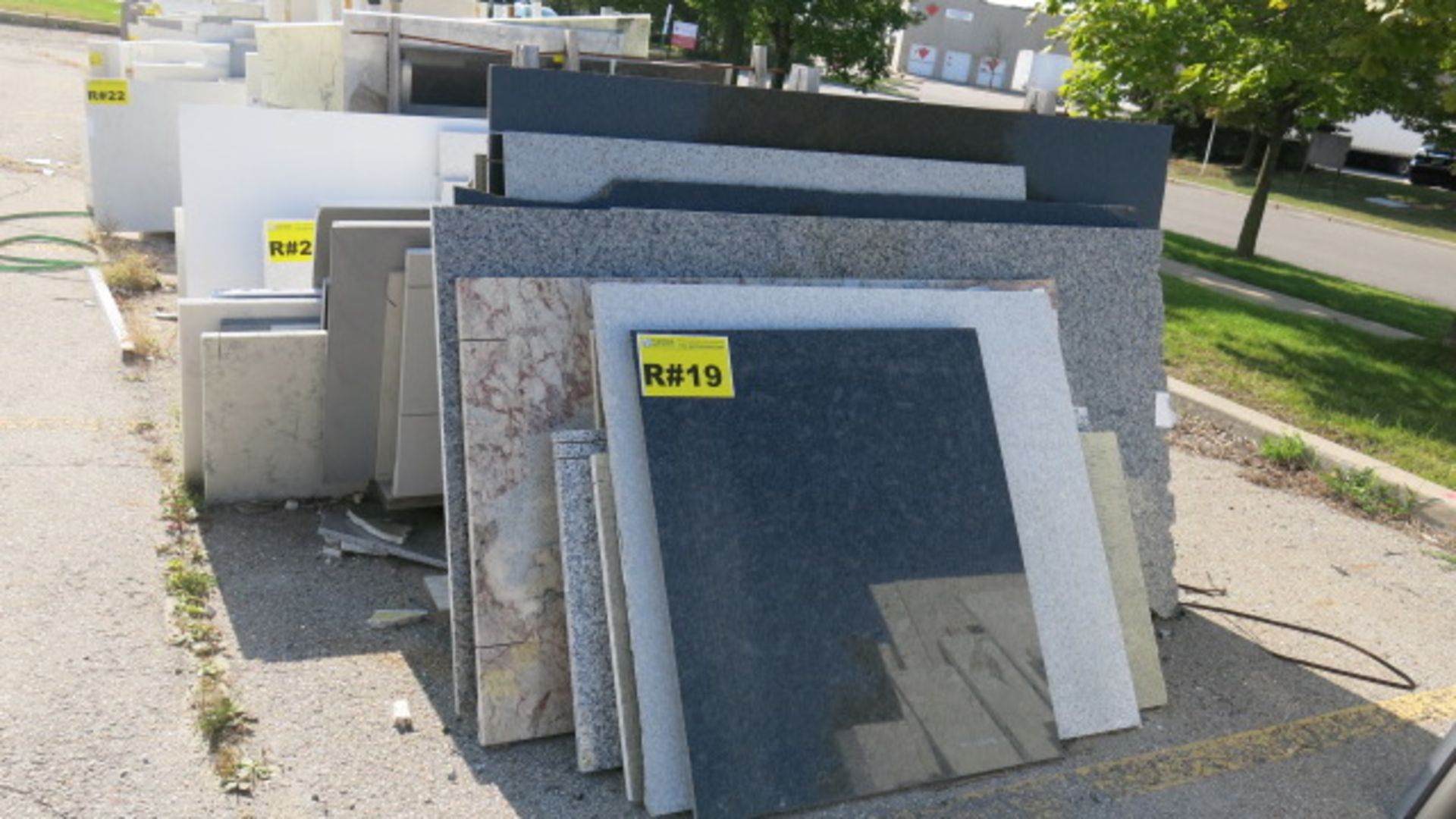 LOT OF (43) ASSORTED GRANITE HALF CUTS COMPRISED OF (16) HALF CUT SLABS, 1 1/4" AND (27) 67" x 118",