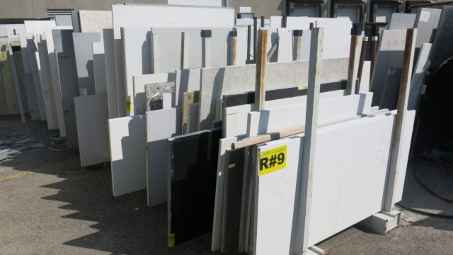 LOT OF (69) ASSORTED QUARTZ SLABS COMPRISED OF (53) HALF CUT SLABS, 1 1/4" AND (16) HALF CUT