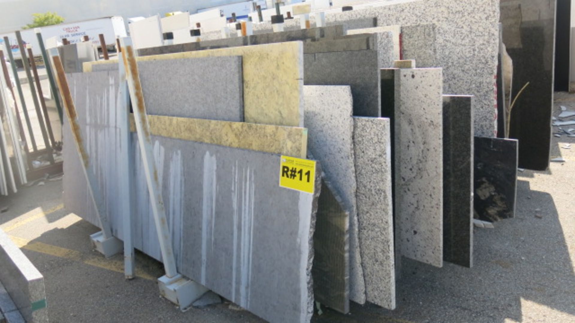 LOT OF (58) ASSORTED GRANITE SLABS COMPRISED OF (33) HALF CUT SLABS, 1 1/4" AND (25) HALF CUT SLABS,