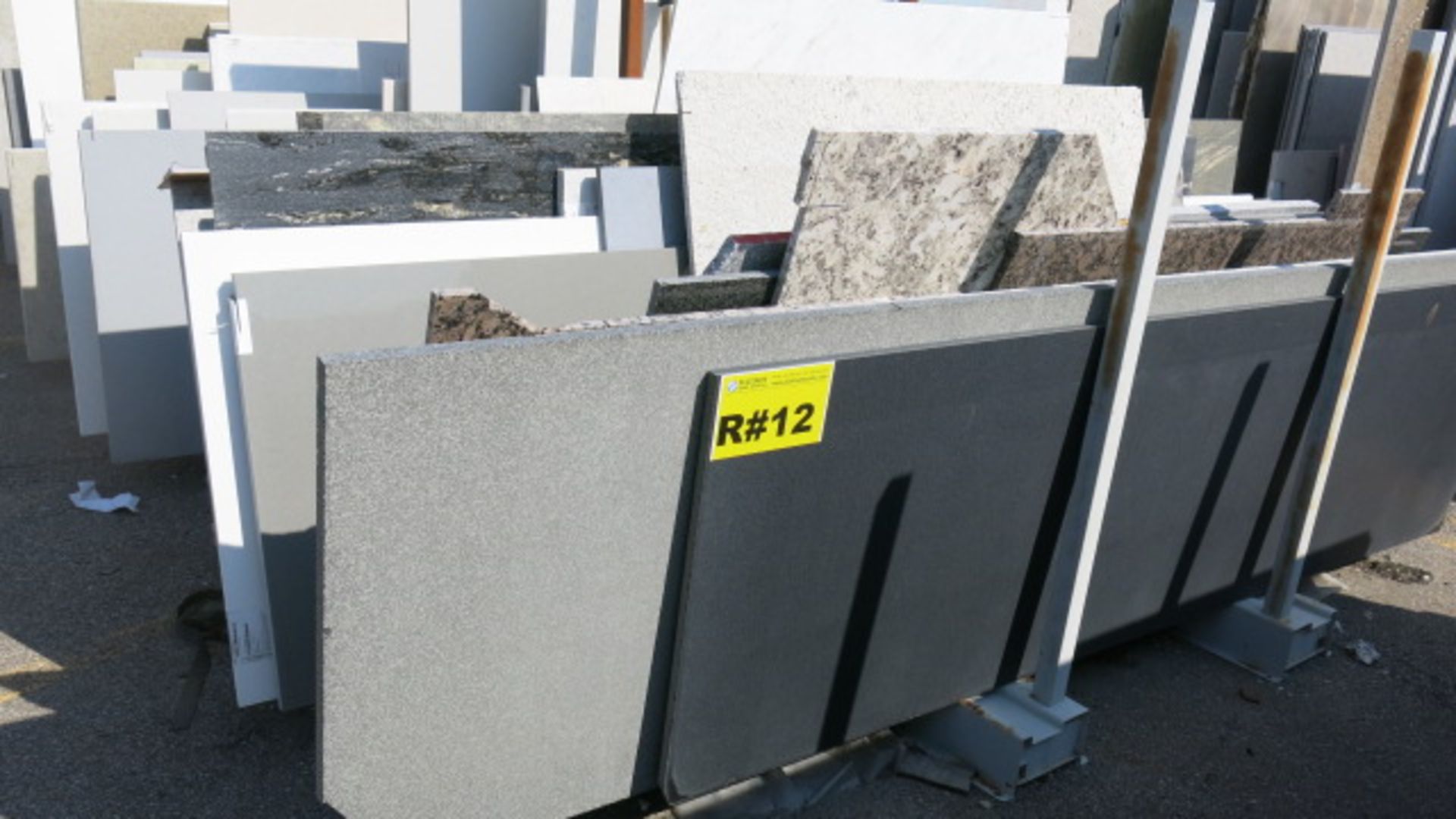 LOT OF (33) ASSORTED GRANITE SLABS COMPRISED OF (13) HALF CUT SLABS, 1 1/4" AND (20) HALF CUT SLABS,