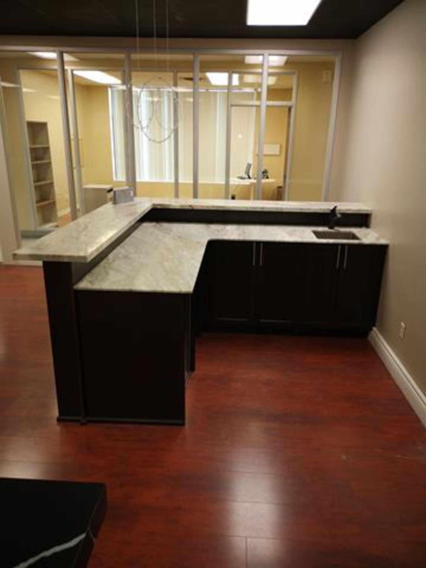 L-SHAPED BAR WITH STONE TOP AND SINK, DIMENSIONS (L,W,H) 96" X 90" X 40" X "42.5