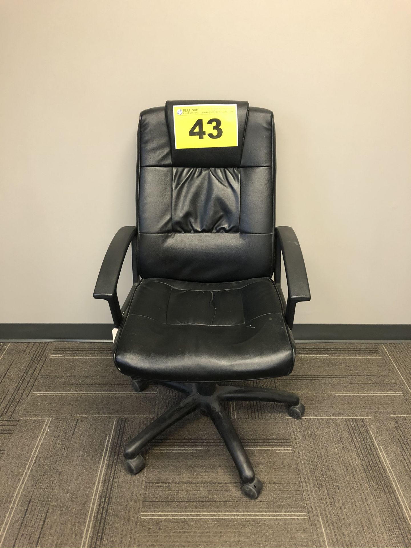 BLACK, LEATHER EXECUTIVE CHAIR ON WHEELS