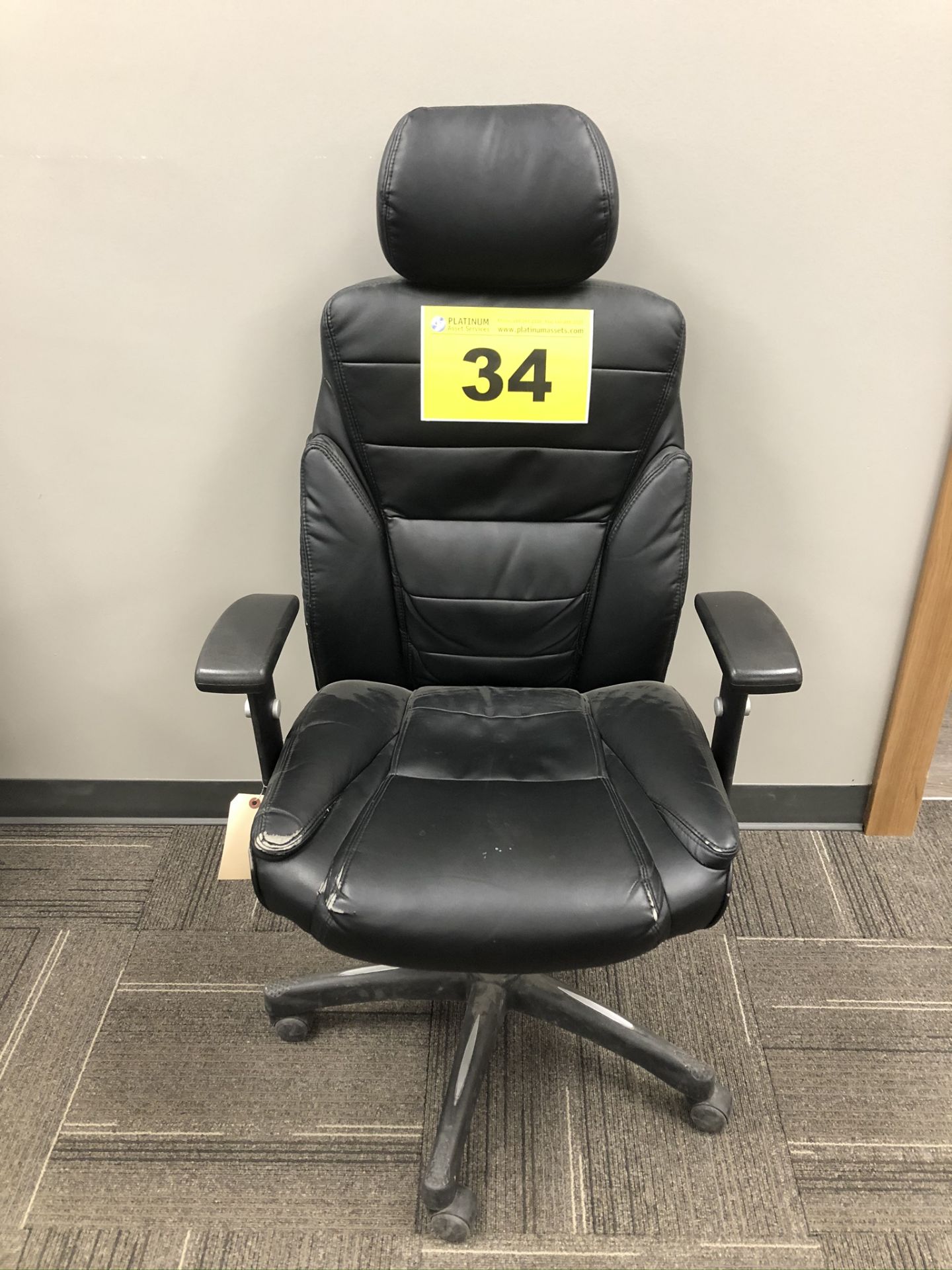 BLACK, LEATHER OFFICE CHAIR ON WHEELS