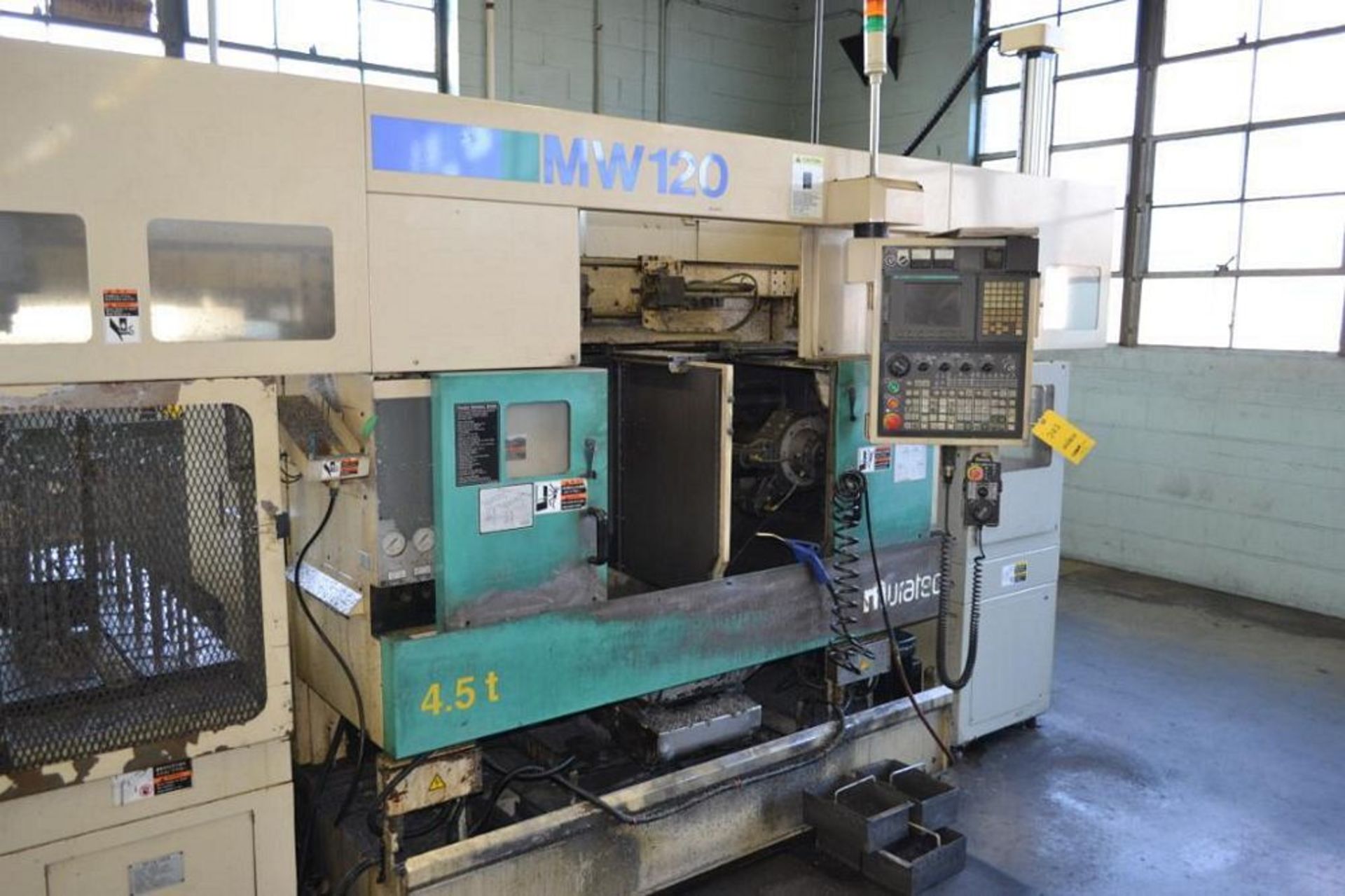 2005 Muratec twin spindle CNC turning center, model mw-120 4.5t, type 1178, muratec/fanuc CNC contro