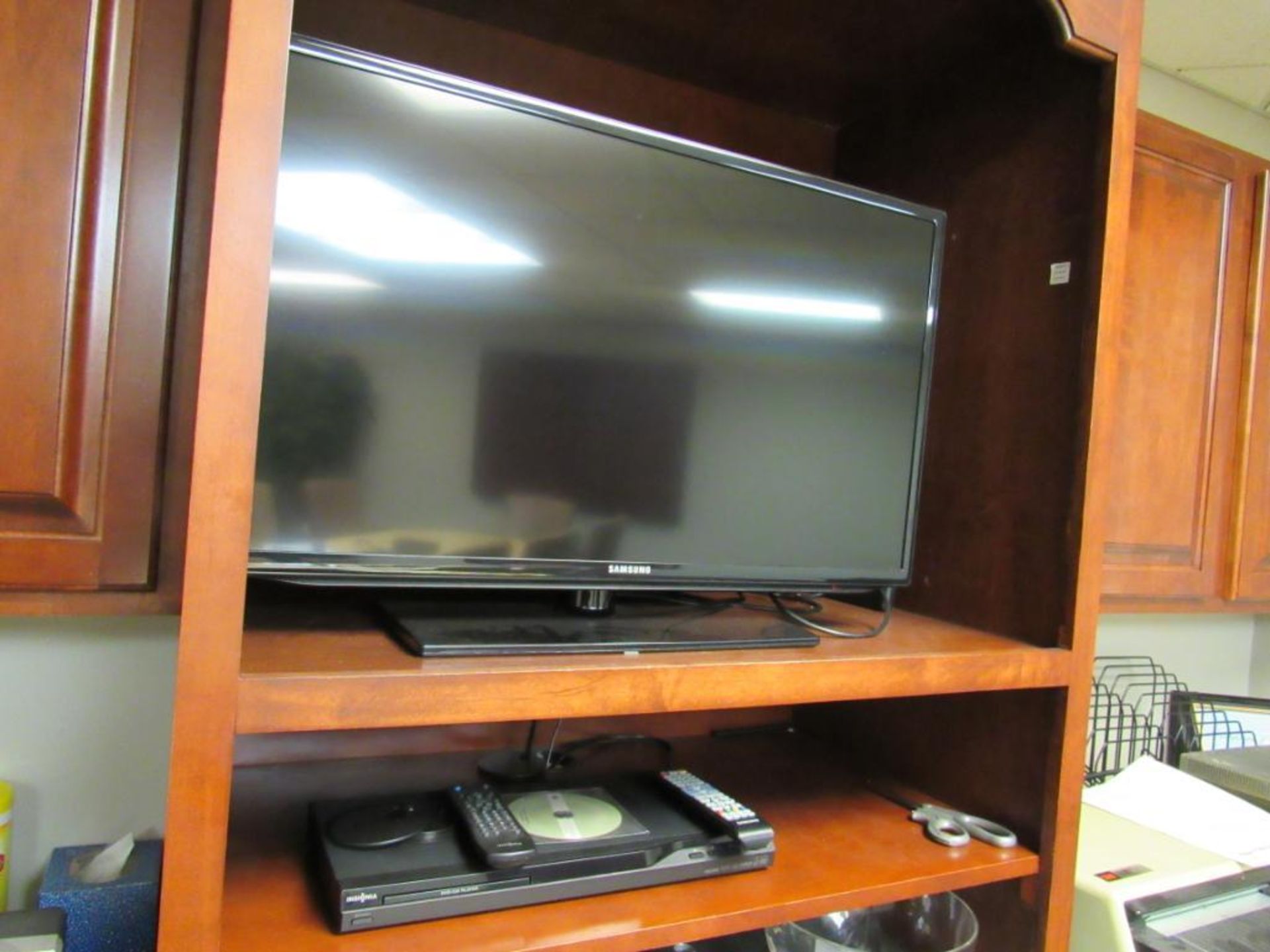 LOT: (1) Samsung 32 in. TV, (1) Insignia DVD/CD Player (in 2nd floor office - Area M)