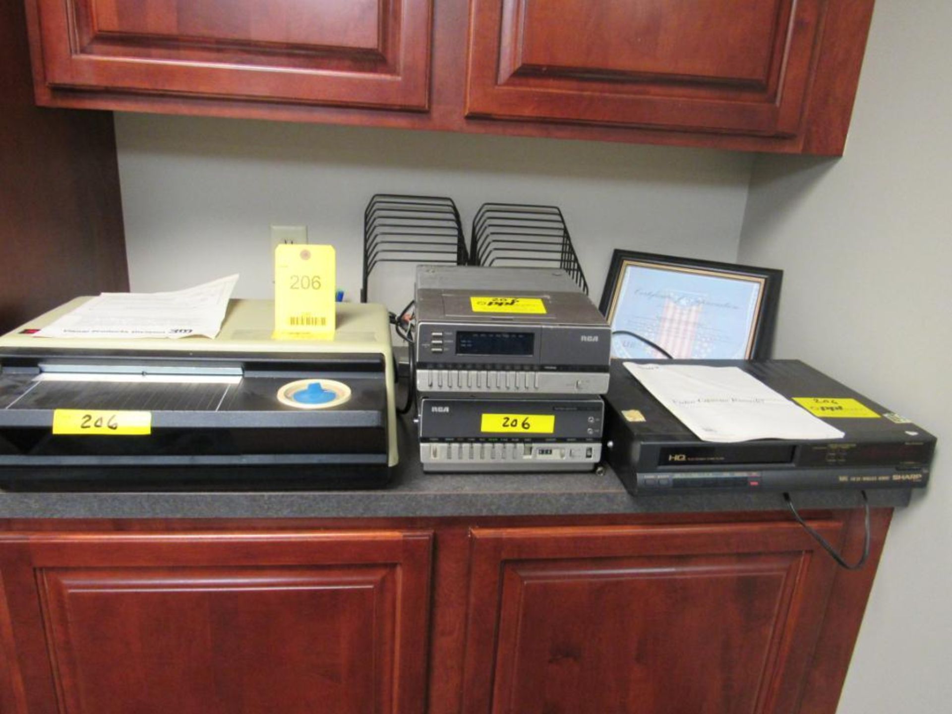 LOT: (1) Sharp VHS Player, (1) RCA Tuner Model TEP 1400, (1) RCA VHS Player Model VEP150, (1) 3M Tra