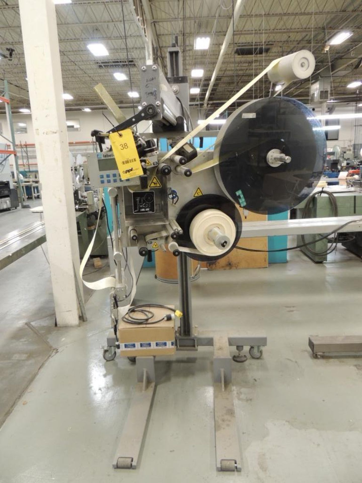 Label Aire Labeler, Model 2111CD on Roll-Away Base