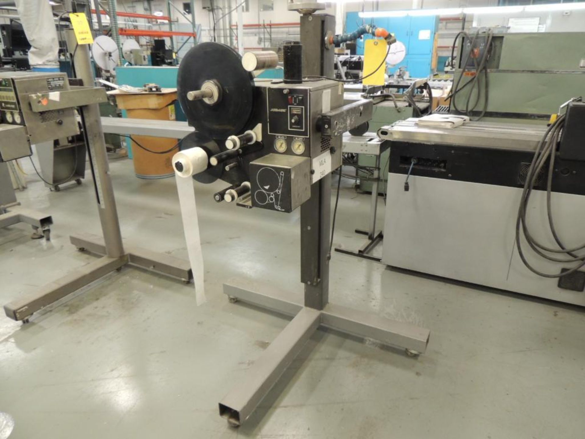 Label Aire Labeler, Model 2111 on Roll-Away Base